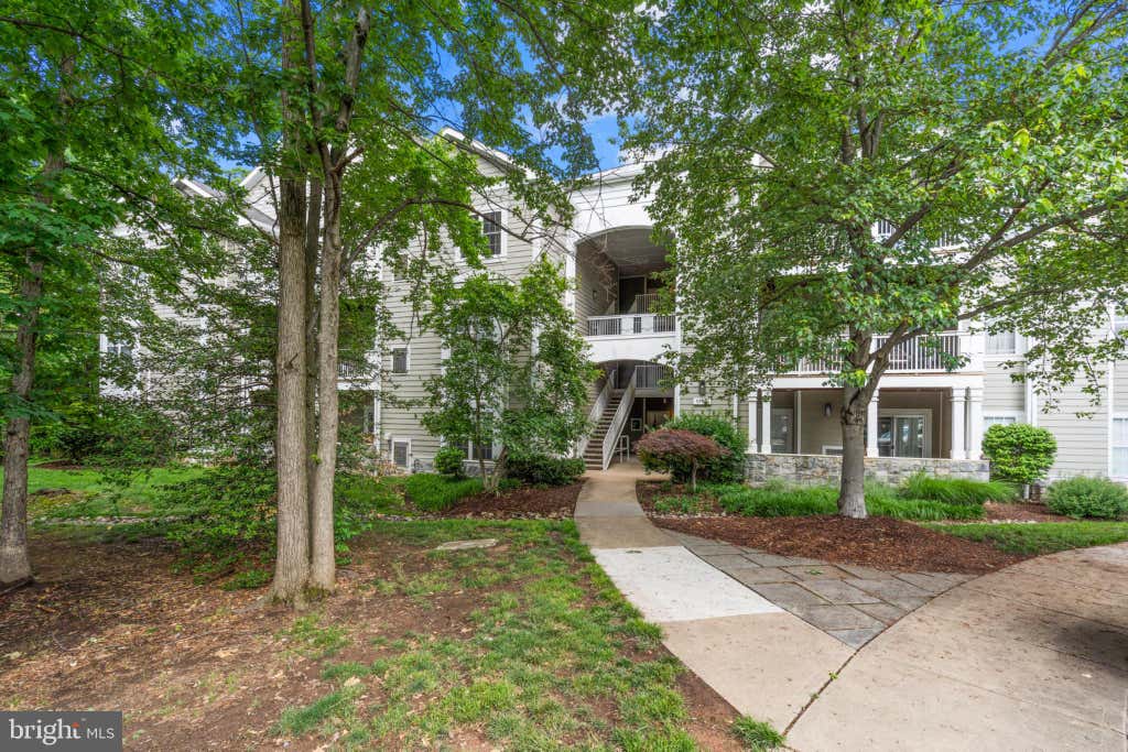 Photo of 1700 Lake Shore Crest Drive #13, RESTON, VA 20190 (MLS # VAFX2313234)