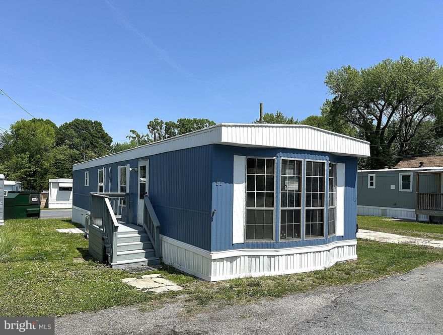 Very Nicely Renovated Single Wide in a Quiet Sparrows Point Mobile Home Community! Updates Include HVAC, Appliances, Laminate Plank Flooring, New Carpet in Bedrooms, Light Fixtures, Celling Fan and Paint Throughout. Home Features an Open Floor Plan with Big Living Room and 2 Nice Sized Bedrooms. Close to Schools, Parks Shopping and Restaurants. Don't miss out on a Chance to own a Great Home at a Great Price!