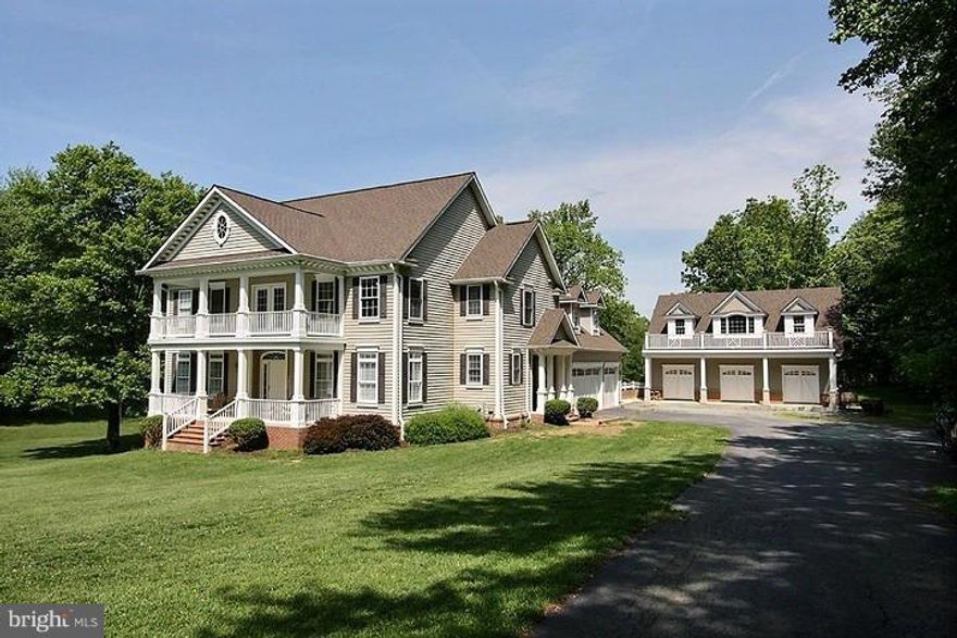 This spacious colonial house sits on 3.9 private, lush acres off the primary road. At over 4000 square feet, there is plenty of room inside and out. This home has a traditional style with an open floor plan and many elegant upgrades. The granite in this house is done tastefully and generously as you'll see in a tour.