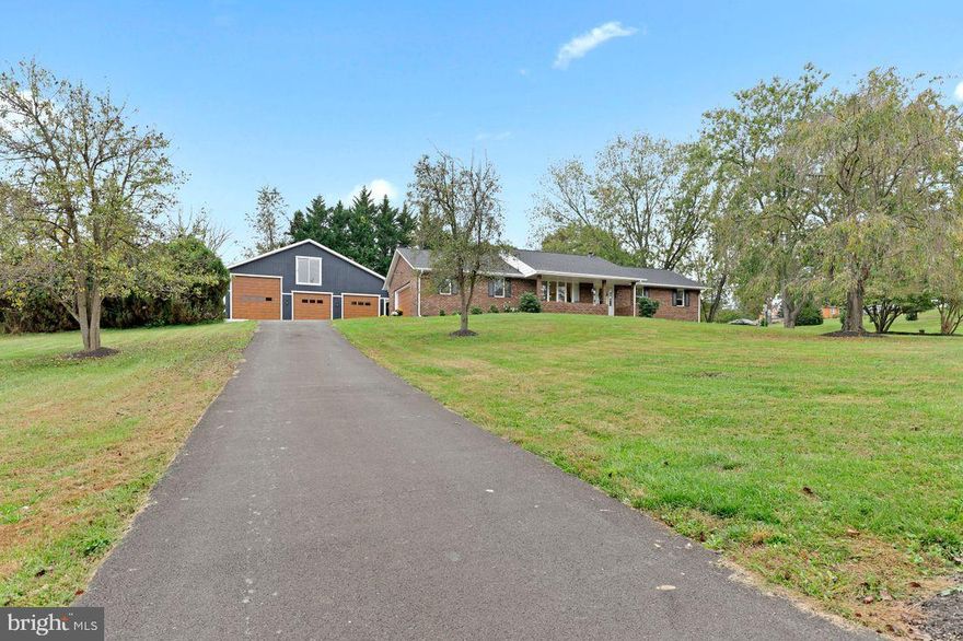 I can not begin to describe how amazing this home is. This home has been completely and professionally  updated and no detail has been overlooked. New roof,  flooring, kitchen, bathrooms, landscaping, plumbing, new septic, paint, they even repaved the driveway. The list goes on. The main level features a wide open floor plan with living, dining and kitchen. All have solid maple  hardwood floors and the country kitchen has all new cabinets, appliances and granite countertops. A massive sunroom located just off the kitchen leads to a patio and professionally landscaped backyard. Perfect for all your entertaining needs. What was the old attached garage is now a massive redesigned room. Listed as the fourth bedroom but could be anything you desire it to be. A new master, giant rec-room or family room. You get to decide! The lower level of the home also screams luxury. Currently used as a giant family room, this level also features new carpet and paint, a fifth bedroom with a full bathroom and a crisp and clean storage/utility room. The lower level also exists to the backyard. AMAZING GARAGE! The Barn/Garage/Workshop is capable of storing a 40 foot RV. The garage features six parking bays, additional storage, electric and plumbing. Stairs lead to a huge unfinished loft that awaits your finishing ideas. DO NOT miss this home. No detail has been overlooked. This is a unique and beautiful home and nothing like it will be available again anytime soon. Convenient to Baltimore, Columbia, D.C., BWI and all the entertainment and restaurants you could ever want.  Click the amazing video and see for yourself.