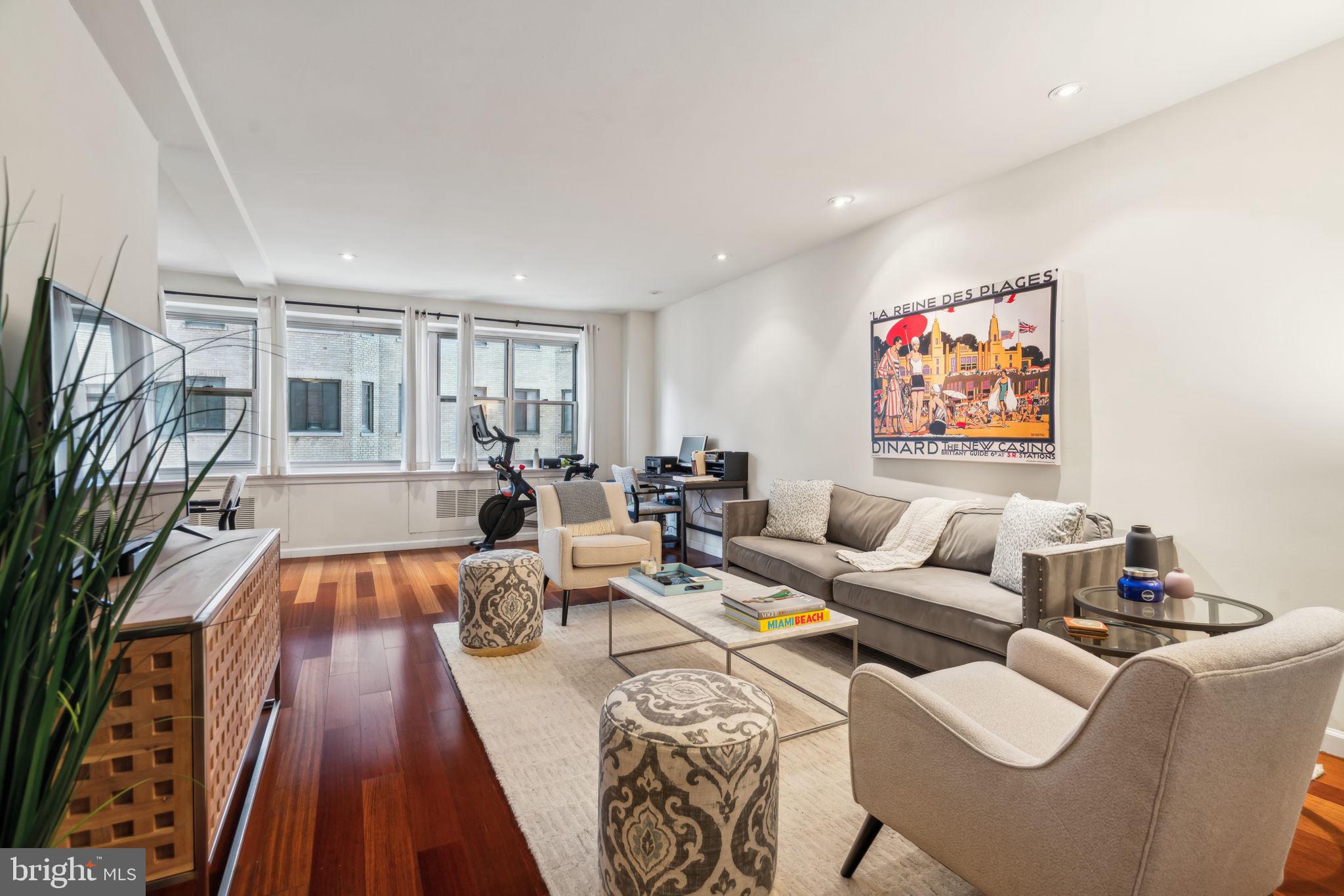 Incredibly spacious, light-filled one bedroom with partial Rittenhouse Square views at 220 W Rittenhouse. Enter through a spacious foyer with two large closets into the expansive great room showered in natural light from a wall of oversized windows showcasing partial views of The Square. There is ample space for multiple furniture layouts and a separate dining alcove open to the living area and kitchen that is ideal for entertaining. The beautifully appointed kitchen featured modern light wood cabinetry, granite countertops, stone tile backsplash, stainless steel appliances, and a tile floor. The bright and spacious bedroom suite enjoys more oversized windows, a ceiling fan, and a massive walk-in closet with custom built-ins. Adjacent is a full bathroom boasting beautiful stone tiling, a wooden double vanity with solid surface top, whirlpool tub shower with seamless glass door, and laundry closet with stacked Bosch washer/dryer. Additional highlights include custom built-ins in all closets, baseboard molding, recessed lighting, and hardwood floors throughout. Residents of 220 West Rittenhouse Square enjoy a 24-hour doorman, a basement laundry room, bicycle storage with an electric charging station, and a membership to the building’s fitness center for an additional fee.