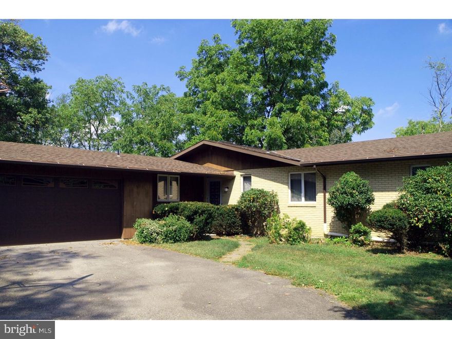 Country living at it's best! Don't miss this spacious ranch home with a .81 acre backyard. This home boasts an eat-in kitchen with lots of cabinet storage, 3 bedrooms and a den/office that could be a possible 4th bedroom. The master bedroom has a large walk- in closet and bathroom.A large dining room/ living room with access to the deck with beautiful views and a wood fireplace. A separate laundry room on the main floor to allow laundry to be easily done without having to carry laundry to a basement. The home does have a large basement for storage, a 2 car over sized garage, and Central AC. Just minutes away from shopping, restaurants and more! Call to set up a tour of this home today!