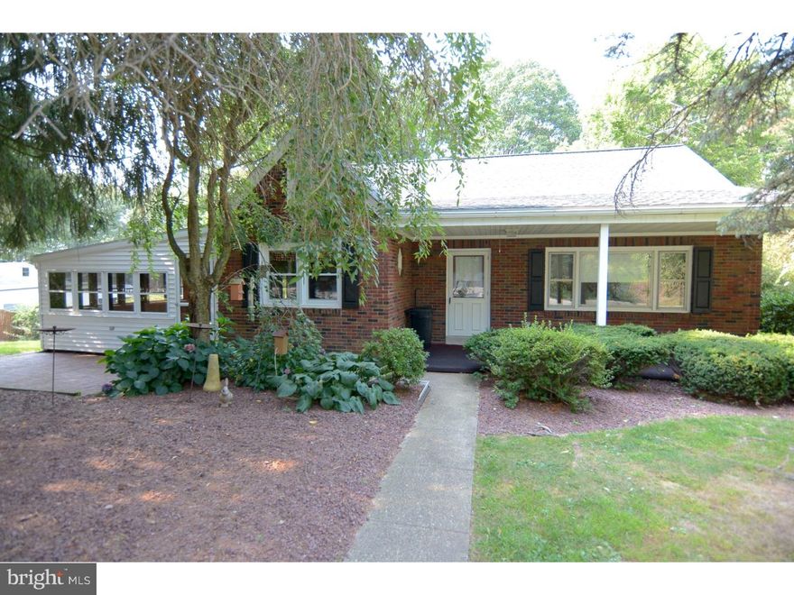 Don't let this one fool you - has more room than you think with lots of exterior yard space. Charming 1 1/2 story brick home on 2.95 acres with detached 2 car garage. Well equipped kitchen with breakfast area with access to sun room. Two bedrooms on 1st floor with bath with two additional bedrooms on the 2nd level with half bath. Lots of room on lower level with 21 x 26 family room with full bath and basement area with walkout. Two car detached garage with finished room on level. Replacement windows and new well. This location affords easy access to Rt. 222, 272 heading to Reading or Lancaster. Square footage includes sun porch area.