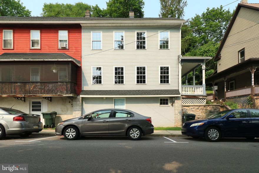 Affordable In-Town Living in Historic Bellefonte.  Enjoy low-maintenance single-family living right in the heart of downtown. This budget-friendly home offers a convenient lifestyle just 18 minutes from Penn State University.  Inside, you'll find a welcoming sun filled family room with wall-to-wall carpet, a cheerful dining area & a bright & breezy kitchen with subway tile backsplash, included appliances & easy-care vinyl flooring. The main level also features a handy half bath & a laundry area for added practicality.  Upstairs offers a spacious owner's bedroom with a walk-in closet & laminate flooring, a second bedroom also with laminate & a full bath with tile flooring. The full, unfinished walk-out basement provides plenty of storage space.  Enjoy two cozy covered side porches & a small backyard.  Additional features include oil forced air heat, double-pane replacement windows, vinyl siding & a recently replaced shingle roof in 2021.  Take advantage of a convenient location just moments from Talleyrand Park, Spring Creek, the Bellefonte Waterfront Walkway, local shops, restaurants, & so much more. A smart opportunity to enjoy in-town living with everyday essentials close by.