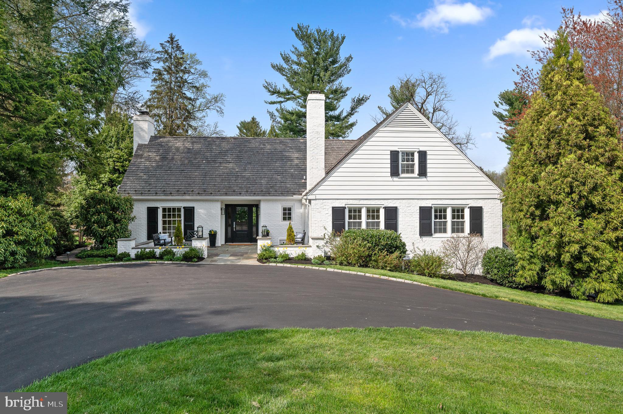 OFFER DEADLINE SATURDAY, APRIL 20th NOON. SATURDAY OPEN HOUSE IS CANCELLED>
Exquisitely renovated, bright and airy Cape Cod located on a sprawling lot
with ample privacy in Devon’s sought-after Shand Tract neighborhood. From the
circular driveway, a stone terrace graces the entryway of this freshly painted home.
The current owners renovated nearly every inch of the property, starting with the
main level, which they opened up to create an easy, seamless flow filled with
natural light. You’ll also find numerous amenities and thoughtful touches
throughout, like refinished hardwood floors, designer light fixtures and recessed
lighting. To the left of the foyer sits an open and inviting family room with wood-
burning fireplace and custom shelving. The family room, abound with large windows opens to a sunny dining area with views of the stone patio and tree-lined greenspace beyond. Just steps
away is the tastefully renovated kitchen with island seating, custom tile backsplash
and range hood, newer appliances and beautiful window seat. Down the hall, a
convenient home office boasts a gas fireplace, built-ins and discreet Murphy bed.
The main floor also includes two spacious secondary bedrooms that connect via
jack-and-jill bath. Upstairs, a delightful primary suite features a gorgeous window
wall, dual walk-in closets and an ensuite full bath with water closet and shower
with frameless glass door. This floor also includes two additional bedrooms that
share a jack-and-jill bath, plus a laundry closet and a full hallway bath. The newly
carpeted, walk-out lower level offers even more space for relaxation and play,
along with a stone gas fireplace, powder room and large storage area with additional stall shower and washer/dryer hook up. The dreamy backyard boasts desirable amenities at every turn, from the large flagstone patio with retaining wall to the secluded pool complete with adorable new pool house
and repaved stone patio. Zoned for award-winning Tredyffrin/Easttown School
District, this home is part of Shand Tract, a close-knit, welcoming community
known for its active neighborhood association and family-friendly events.
Countless popular Main Line destinations are mere minutes away as well,
including downtown Wayne, Gateway Shopping Center, Devon Yard and Jenkins
Arboretum & Gardens. Don’t miss this chance to own a premier property in one of
Devon’s most coveted neighborhoods!
