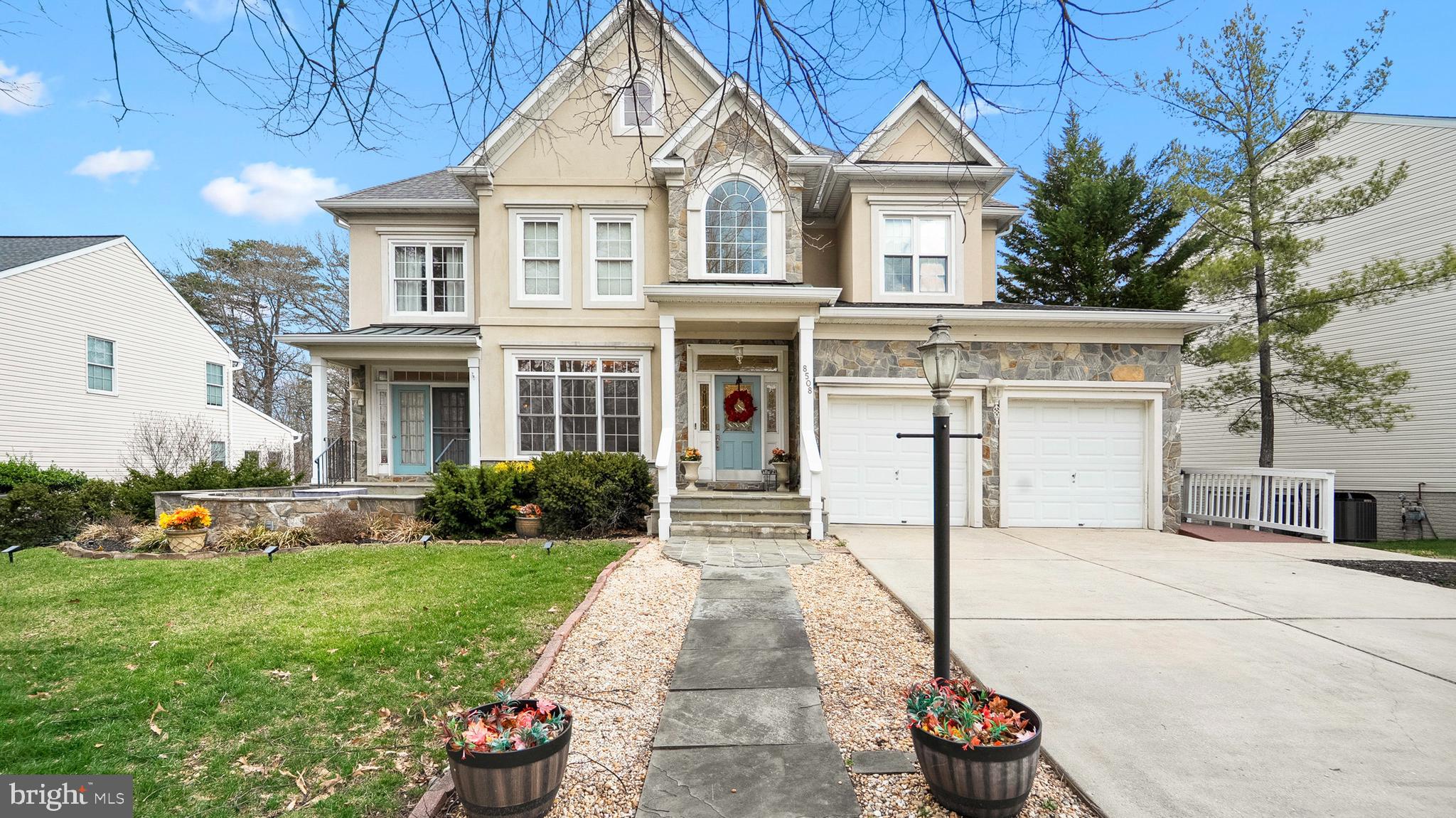 This custom-built residence is one of just seven original Piney Orchard Dream Homes, offering refined finishes and thoughtful architectural details throughout. From the inviting curb appeal to the spacious interior, the home blends timeless charm with modern comfort.
A two-story foyer welcomes you inside and opens to formal living and dining rooms, ideal for entertaining. These spaces feature crown molding, picture frame trim, a built-in china cabinet, and access to a lovely front stone patio. Hardwood flooring, elegant trim work, and generous room sizes create a sense of warmth and sophistication throughout the main level.
The renovated gourmet kitchen is thoughtfully designed with quartz countertops, a subway tile backsplash, white 42-inch cabinetry, a contrasting center island with breakfast bar, and a butler’s pantry. High-end appliances include a gas cooktop with range hood. Adjacent to the kitchen, a sunlit breakfast room features a wood-planked cathedral ceiling and access to the rear deck.
The open floor plan continues into the family room, complete with a coffered ceiling, palladian windows, and one of three fireplaces found throughout the home. A main-level den or study with French doors and built-in bookcases provides the perfect space for work or reading. A full bath completes this level.
Upstairs, the primary suite offers a lighted tray ceiling, a sitting room with a three-sided gas fireplace, a walk-in closet, and an en-suite bath with dual vanities, soaking tub, and separate shower. The en-suite bath also offers convenient direct access to the dual-entry laundry room. Three additional well-sized bedrooms and a full hall bath complete the upper level.
The fully finished walkout lower level includes a spacious recreation room with fireplace, a kitchenette with wet bar, wine cellar, theater room, a fifth bedroom, and a full bath. Outdoors, enjoy a large deck and stone patio that overlook a fenced backyard backing to trees.
Recent updates include a new roof, oversized gutters, garbage disposal, sump pump, and more.
Located in a well-appointed community with indoor and outdoor pools, tennis courts, a community center with exercise and meeting rooms, and a scenic lake with walking paths. Conveniently situated near commuter routes, BWI Airport, Fort Meade, Baltimore, and Washington, DC.
This is a rare opportunity to own a truly special home in a sought-after location.