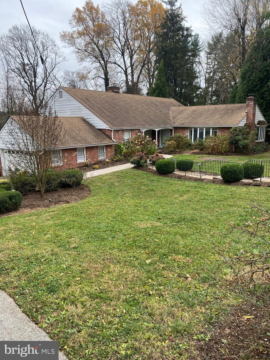 Unique  Main Line gem that has it all prime quiet cul-de-sac location, approximately one acre professionally landscaped grounds, move-in conditions with many updates, in-law/Au Pair suite, highly rated Lower Merion schools. Over the years present owner has made many improvements and additions to interior and exterior of property. Major renovations include addition of in-law suite with large ADA compliant bathroom ensuite, bedrooms, walking closet, bathrooms and kitchen redesign, whole house generator as well as new updated electrical panel. 
As you walk down newly installed stone pathway, you will find a cozy ample front porch leading to the front entrance to the house on right side and a storage room with cedar closet on your left. Entering the house, there is a welcoming foyer with coat closet across from vaulted ceiling living room with wood burning fireplace dining room and large gourmet eat-in kitchen. Kitchen highlights include custom cabinetry, large island, durable quartz countertops, gas stove top with grill, double oven, microwave and pocket door to formal dining area. Kitchen and dining room were designed to provide all conveniences of every day use or entertaining.
Up the stairs, you will find bedrooms, hall bathroom and large primary bedroom suite with marble bathroom featuring soaking air massage tub. Master bedroom suite has a sitting area, and a spacious walk-in closet with organizers.  One of the rooms is used as a laundry room/office, but can easily be converted back to bedroom.
Lower level quarters adds a lot of living space. From the 2-car garage, you enter the spacious family room with a Franklin Stove, full wall bookshelves, bar area, and convenient powder room. Down the hall, you will find a storage area, utility room and exit to the canopied back patio. Utility room currently has additional refrigerator for outside entertaining. Previously, it was used as laundry room, and can easily be converted back with an access to washer and dryer hook ups. Also on lower level, beautiful and spacious in-law suite was thoughtfully designed to meet any need of privacy, act as pool changing area, or be incorporated in general household use.This large room has space for sleeping area as well as sitting/dining area. Ensuite bathroom with no threshold and walk-in shower. There is also a compact kitchenette with small appliances.Sliding doors lead you to the back patio. Beautiful private and lush fenced in backyard with in-ground pool.
This home is perfect for those seeking a peaceful retreat, while close to all the amenities the Main Line has to offer. Conveniently located close to the charming village of Gladwyne, corporate centers, Center City and Airport, with an easy access to Rt 476, Rt76, Pa Turnpike.