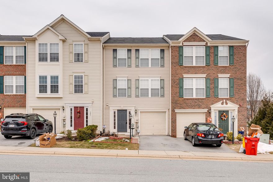 This 3 bedroom 2.5 bath townhome is in impeccable shape! Situated in the Fairfax Crossing subdivision you're in the perfect position to commute to both Virginia and Maryland.  Between the long driveway and the garage you will have plenty of parking. The welcoming foyer features easy garage access, a convenient coat closet, and your powder room with pedestal sink. Beyond the foyer is your finished basement. Here you have two large carpeted rooms with recessed lighting. This space also includes a convenient laundry closet and access to your patio. This could be a rec room, a play room, a home office - so much potential in this space. Upstairs you have a large carpeted living room with bright windows and ceiling fan. This opens to your dining room with vinyl floors and decorative fixture. The large kitchen features such amenities as oak raised panel cabinetry, Corian countertops, large pantry, and island with breakfast bar. You'll want for nothing in this space. This opens to the morning room with a great wall of windows and doors to your deck. Upstairs you have three generously sized bedrooms. The hall bath features a linen closet for great storage. The master suite is spacious and features bright windows and ceiling fan. The master ensuite bath features ceramic tile floors, glass walk-in shower, and large soaking tub with ceramic tile surround. This is the perfect space to take sanctuary after a long day's work. The master suite is completed by a huge walk-in closet. Outside the home you have a huge wrap around deck with Pergola detail. Below is a concrete patio if you have to enjoy the outdoors with some shade. Beyond this is your large, level yard. A great space to run around with friends, family, and pets. This home has everything you could want in the location you need! Don't wait on this home - give us a call for your showing today!