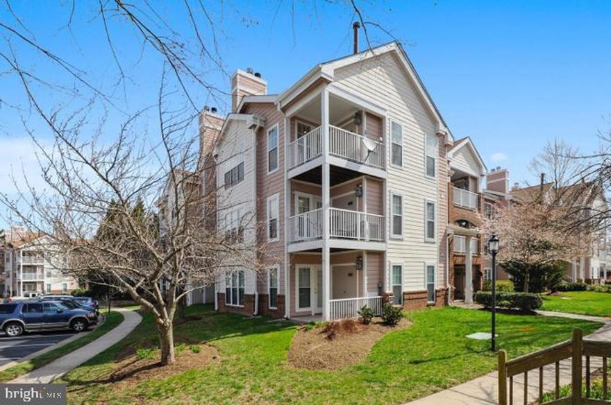 SPACIOUS 2 BEDROOM 1 FULL BATH CONDO IN SOUGHT AFTER ASHBURN FARM! * FLOODED WITH LIGHT * FIREPLACE IN LIVING ROOM * WASHER AND DRYER IN UNIT * BALCONY TO ENJOY COOL SUMMER EVENINGS * WELCOME HOME!!