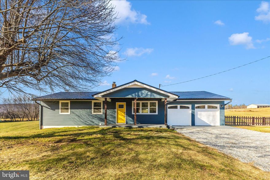Fully Remodeled Rancher with Breathtaking Countryside Vistas.  Discover the best of rural living in this captivating, fully updated ranch-style home.  The recent renovation includes a brand-new chef's kitchen with butcher block countertops, new self closing cabinets, new Samsung appliances (dishwasher, stove, and refrigerator), new tile flooring.   Other home updates includes:  New metal roof, new siding, new bathrooms, fixtures, new windows & blinds, mini splits for heating/cooling in all bedrooms and living areas, new hot water heater, new garage doors.  Main level has 3 bedrooms & 1 Full Bathroom, Kitchen, Living Room, and Dining area.  Basement completely finished to include a 4th Bedroom, Full Bathroom with double sink, family room with gas fireplace (White washed brick & new mantle), and also equipped with a half bathroom.  Walk out basement to patio area with fire pit.  Enjoy serene views from the patio perfect for entertaining or quiet mornings.  Ample outdoor space for gardening & outdoor activities on almost a half acre lot! Close to Boonsboro, Harpers Ferry, Hagerstown, & Frederick.  Experience the lifestyle this exceptional property offers.  Schedule a showing to see this gem today because it won't last long!