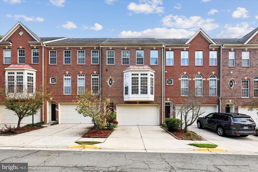 Beautiful 3 Bedroom, 3.5 Bath Brick Front Townhome in Lorton Valley North. This Hazelton Model Features a Sunny 3 Story Rear Bump Out, Deck, Fully Fenced Yard, and a 2 Car Garage. The Open Main Level has Newly Refinished Hardwood Floors (2025), Crown Molding, 3-Sided Fireplace, Full Length Bay Window, Lovely Kitchen with Island, and a Breakfast Nook that opens to the Rear Deck. Upstairs, the Primary Suite offers a 9ft Tray Ceiling, Two Large Walk in Closets, and Ensuite Refreshed Primary Bathroom with Shower and Soaking Tub. The Upper Level is Complete with Two Guest Bedrooms and the Remodeled Guest Bathroom (2024). The Fully Finished Lower Level Features a Large Rec Room, Full Bathroom, Laundry, and Walks out to Garage and Fenced Backyard. HVAC (2022) and Water Heater (2021). This Home is Well Located on a Quiet Cul de Sac Facing a Wooded Area with Trail Access to the Laurel Hill Trail System for Hiking, Walking, and Biking. Lorton Valley North Amenities include a Clubhouse, Fitness Center, Pool, Tot Lots, and Trails. Convenient to 95 and the Lorton Station VRE and Easy Access to Fort Belvoir, 30 Minutes to DC, and 30 Minutes to Quantico. Halley ES, South County MS, and South County HS Pyramid.
