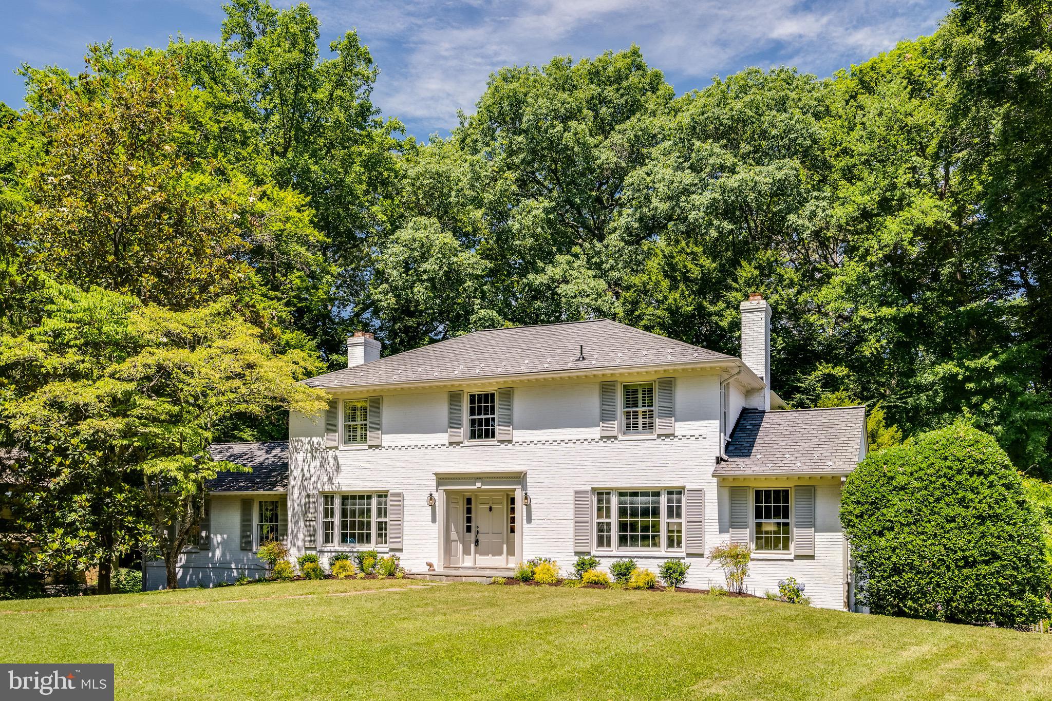 Welcome to this stately, all brick colonial style home, perfectly nestled in the coveted Arrowood community of Bethesda (Whitman school district). This elegant residence is set on a sprawling half-acre lot, complete with a swimming pool, offering a luxurious and serene lifestyle.
The upper level boasts four spacious bedrooms and two full baths, including a large primary suite with a dressing area and private bath. The main level greets you with a grand entry foyer featuring a curved staircase, leading to a family room with built-in shelving and a cozy fireplace. A large living room, a formal dining room with a bay window overlooking the picturesque rear yard and swimming pool, and a sizable bonus room complete the main level, providing ample space for relaxation and entertainment.
The lower level offers a finished family room with a wet bar and a third fireplace, an additional bedroom, and a full bathroom. From here, you can access the rear patio and swimming pool, perfect for outdoor gatherings and enjoying sunny days.
This home also includes a convenient two-car garage, ensuring plenty of parking and storage space. Located in the highly desired Whitman school district and close to many outstanding private schools, this residence offers easy access to downtown Washington and Northern Virginia, as well as nearby shopping and dining options.