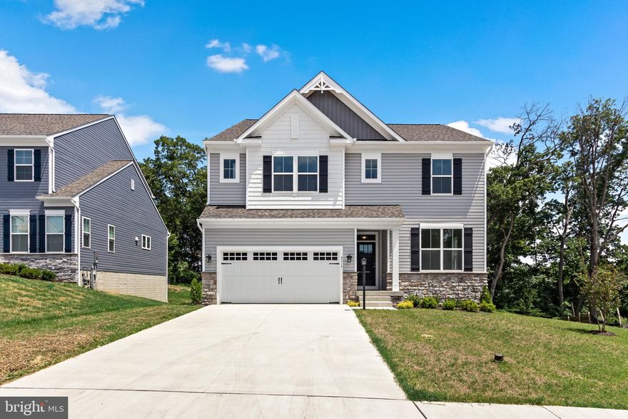 Welcome to The Alexander II at Perry Hall Ridge! This stunning 3-bedroom, 3.5-bath Craftsman-style home exudes charm and modern elegance. As you approach, the inviting front porch sets the tone for relaxation and friendly neighborhood chats. Step inside to the main level, where the warmth of laminate plank flooring guides you through the foyer. To your right, French doors open to a spacious office, perfect for remote work or creative endeavors. The heart of the home is the gourmet kitchen, boasting an oversized island with a breakfast bar, abundant cabinetry, stainless steel appliances, recessed and pendant lighting, and gleaming quartz countertops. This kitchen is designed for both culinary adventures and casual gatherings. The kitchen seamlessly blends into the great room, where vaulted ceilings and natural light create an open, welcoming space perfect for both everyday living and entertaining. Adjacent to the kitchen is the bright and airy breakfast room, doubling as the dining area. From here, you can access the pantry or step through the door to your potential deck, ideal for outdoor gatherings. Near the garage entry, discover additional cabinet and counter space, perfect for a command center or coffee bar. Ascend to the upper level, where comfort and convenience await. The massive primary suite is a true retreat, featuring plush carpeting, a luxurious bath with a soaking tub, shower, dual vanity sinks, and a walk-in closet. Two additional bedrooms, each with a walk-in closet, share a Jack and Jill bathroom with dual vanity sinks and a tub/shower combo. The upper level also includes a convenient laundry room. The lower level offers a versatile family/recreation room with carpeted flooring and a walkout to the rear yard, where you’ll enjoy privacy backed by trees. A full bath and an unfinished area, perfect for a den or storage, add to the home's flexibility. Parking is effortless with a 2-car attached garage, a concrete driveway, and on-street parking. Nestled in a charming cul-de-sac neighborhood with only 21 homes, this residence offers a perfect blend of community and tranquility. Come and experience The Alexander II at Perry Hall Ridge in person – where modern amenities meet timeless craftsmanship. Your dream home awaits!  ALL ALLOWABLE CLOSING COSTS PAID! with use of preferred lender and title company.