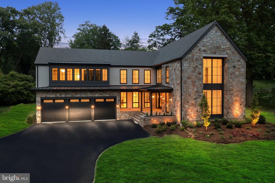 Welcome to 913 Drexel Lane, where modern transitional design meets meticulous craftsmanship on a peaceful one-acre lot in a private Bryn Mawr cul-de-sac. This nearing completion architectural gem boasts 8,110 square feet of luxurious living space. Upon entry, you're greeted by soaring cathedral ceilings and engineered 9" plank white oak floors on every level. The home features custom built-ins at every turn, including a stunning two-story wall of shelves in the great room.

The open floor plan effortlessly caters to both entertaining and relaxation, with expansive windows that fill the space with natural light. A sophisticated security system, integrated speakers inside and out, and pre-wired windows for automatic blinds add to the home's thoughtful details.

The chef’s kitchen is an epicurean’s delight, featuring a dual-fuel Wolf 6 burner with griddle, double oven range, drawer microwave, SubZero refrigerator, two wine and two beverage refrigerators, a generous island, butler’s pantry with wet bar, and a fully equipped walk-in pantry, along with island seating and a built-in banquette for casual dining. Additional highlights include an office, guest suite, two half baths, an enviable mudroom, access to the 3-car garage, and a spacious laundry room.

Upstairs, the primary suite offers a luxurious retreat with a spa-like bath, with a sizable multi-function dual shower, spacious walk-in closet, and cozy sitting room with picturesque views. This level also includes an upstairs pajama lounge overlooking the great room, three additional bedrooms—one with an ensuite—generous closets, a loft area, and an extra laundry room.

The daylight lower level provides versatile space with an entertainment area, guest/au pair suite, wet bar, a gym and ample storage. Outdoor living is elevated with a charming covered front porch and a partly covered flagstone patio featuring a stone fireplace and pre-plumbing for a kitchen, perfect for tranquil evenings.

Modern conveniences are woven throughout, including Wi-Fi switches, Cat 6 to all TV locations, four HVAC units with five zones, plus a garage split system, ensuring comfort and connectivity at every turn.

Experience the seamless blend of modern design and timeless elegance. This home offers proximity to transportation, shops, and restaurants. Don’t miss your chance to own this exquisite home. Schedule a private tour today to explore the work-in-progress and discuss the unique details with the builder. Please note, the property will be reassessed by the county upon completion.