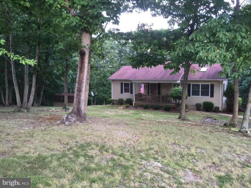 Enjoy the beautiful country setting but yet minutes away from the town of Culpeper.  This wonderful 3 bedroom/2bath home is located on 1.72 acres, offers beautiful wood floors with carpeted bedrooms.  New skylight in the family room, heat pump 1yr old, newer hot water heater, stainless steel appliances, Therma true front door, double pane windows.  This is a must see home.