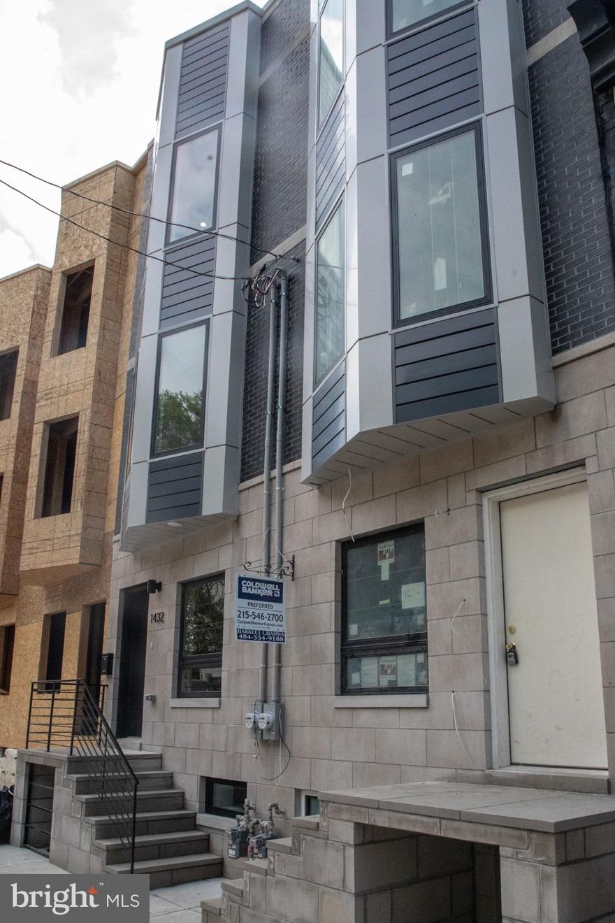 High-quality NEW CONSTRUCTION home made by a meticulous builder. Special attention will be given to each and every detail in the building of this state of the art project. Located in the hot and sizzling Brewerytown section of Philadelphia, this home is surrounded by numerous new constructions and recent rehab projects. This gorgeous 1900 sqft home has 4 bedrooms with 3 custom bathrooms. The home boasts hardwood floors, recessed lighting, low VOC paint throughout the house, smoke/carbon monoxide detectors, fire-sprinkler system, and is also cable ready. Enter the home to be greeted by a well-lit and spacious grand living room. Past the living room you enter into an open eat-in kitchen and dining area. The beautifully appointed kitchen is outfitted with soft-close cabinets, contemporary counter-tops/backsplash, SS appliance package (dishwasher, fridge, range, microwave), pot filler above the range, a chef's facuet for the sink, and under cabinet lighting. Just past the kitchen you will find the entrance to the spacious concrete backyard. From the first floor, staircases lead you up to the 2nd level of the house. Here the home presents two amazing sunlit rooms, and a spacious bathroom with a custom vanity set. Following the staircase to the 3rd level you enter to your own private oasis. The 3rd floor has the master level with a bedroom, custom spa-like bathroom, wet-bar and a spacious walk-in closet! The master bath boasts custom tiles, custom his & her vanity set, and designer rainfall shower. Take another step up the stairs to the pilot house where you will find the access to you private rooftop deck. The home has electric and water lines on the rooftop, making it an ideal area to host parties and get-togethers. The finished basement offers a spacious bedroom or home office, custom full bathroom, utility closet, and laundry room. Extra included bonuses: Extra Large High Energy Efficient Casement windows, energy efficient HVAC, tankless water heater, organized closet shelving system, 1 year builders warranty, 10 year TAX ABATEMENT and much much more! MUST SEE! Some features might be altered as per builders discretion. Early enough buyers will be able to customize some aspects of the home. Pictures are renderings of the project. Currently still under construction. Pictures are of similar home constructed by builder.