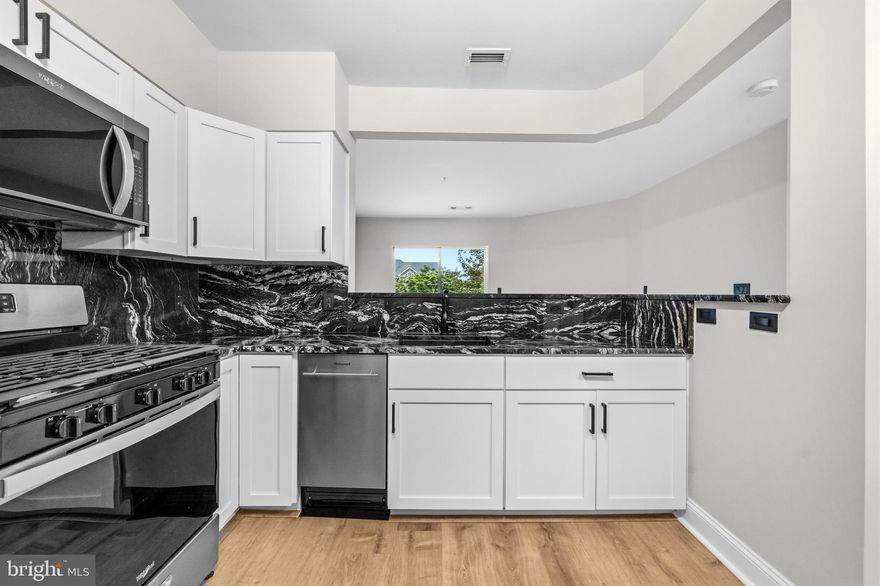 Completely renovated from top to bottom, this stunning property in Worldgate offers turnkey living with high-end finishes throughout. The thoughtfully redesigned kitchen features custom Amish-built cabinetry complete with pull-outs, elegant granite countertops, and stainless-steel appliances.

Beautiful LVP flooring flows seamlessly throughout the unit, complemented by fresh paint and updated lighting fixtures. The fully renovated bathroom showcases new tile, a modern vanity, updated shower, and stylish mirror.

The inviting family room with fireplace opens to a private balcony—perfect for relaxing or entertaining. The spacious primary suite includes a walk-in closet for ample storage.

Additional highlights include a dedicated garage parking space, with the option for additional parking in the lot, plus plenty of visitor spaces available and convenient in unit washer dryer.


Worldgate Condos is situated on 17.5 acres and provides residents and their guests two pools with lifeguards on duty during pool hours, complimentary Wi-Fi, a clubhouse with clubroom (also available for rent), 24-hour access to the exercise room, paved walking trails throughout the community, and convenient on-site management at the clubhouse. Conveniently located moments from Worldgate Centre with a movie theater, restaurants, retail, and a health club/day spa. Minutes from multiple parks, the WO&D Trail, Route 267, and just blocks from the Silver Line Metro at Monroe Station. Perfect for today’s easy-living lifestyle.