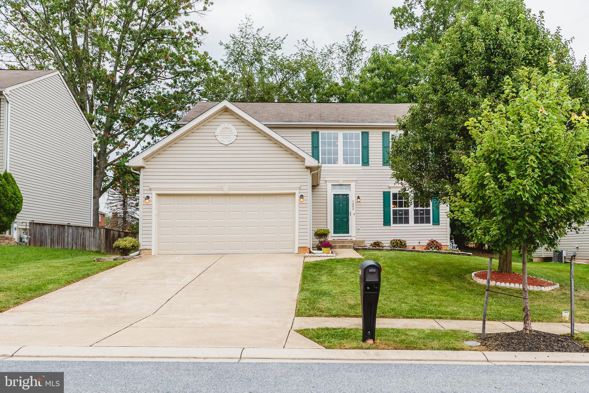 WELCOME HOME TO THIS SPACIOUS COLONIAL! 4 BEDROOMS WITH A 5TH IN THE FULLY FINISHED BASEMENT. BASEMENT HAS FULL BATHROOM, DEN/FAMILY ROOM AND COULD BE A COMPLETE IN LAW SUITE. 3 FULL AND 1 HALF BATHROOMS TOTAL. GORGEOUS FULLY ENCLOSED GLASS PATIO OFF OF KITCHEN FOR YEAR ROUND LIVING. KITCHEN HAS BEEN COMPLETELY REMODELED. NEW WHITE CABINETS, LIGHT FIXTURES AND ALL NEW STAINLESS STEEL APPLIANCES. JUST FRESHLY PAINTED THROUGHOUT. HARDWOOD FLOORS IN KITCHEN, LIVING ROOM, STAIRS AND UPPER LEVEL HALLWAY. NEW CARPET IN ALL OTHER AREAS. LARGE 2 CAR GARAGE.