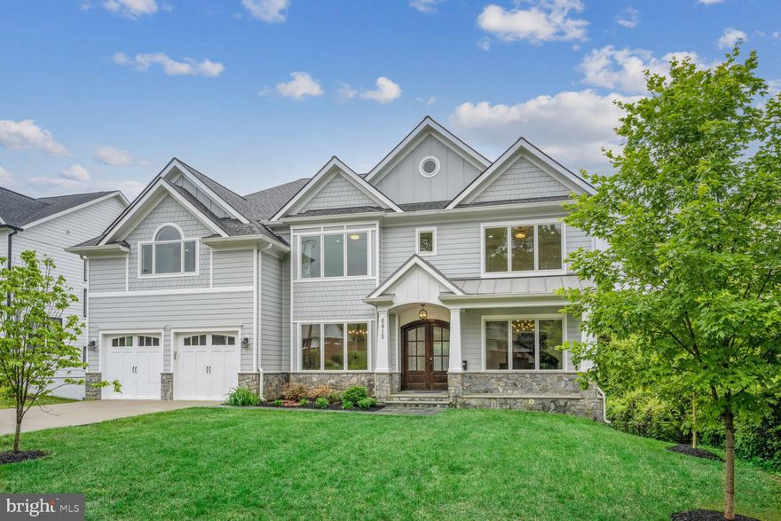 Welcome to luxury living in the heart of McLean. This exceptional custom-built residence, completed in 2020, offers a sprawling 7636 sq. ft. of grandeur with walkout lower level. Meticulous craftsmanship and top-tier quality shine throughout, with the owner personally overseeing every stage of construction and selecting only the finest material. Oversized Pella lifestyle casement windows on all three levels flood the space with natural light. Enjoy 4” white oak hardwood floors on the first and second levels, while Porcelonosa tiles add sophistication to all 6.5 bathrooms. Tailored closets with customized shelves offer ample storage, and integrated media and Ethernet wiring, along with three WiFi access points, ensure flawless coverage throughout the home.
The main level showcases 10-foot ceilings and 8-foot interior doors, creating an expansive and airy atmosphere. A gracious foyer leads to living and dining rooms with tray ceilings and accent lighting. For the culinary enthusiast, the gourmet kitchen is a dream come true, featuring meticulously crafted stacked cabinets, quartz countertops, and a suite of top-of-the-line Miele professional appliances. Indulge in a luxurious 48-inch counter-depth refrigerator, a brand new high-performance 6-burner range top, newly installed cutting-edge wall and steam ovens, and not one but two dishwashers for effortless cleanup. The addition of a second kitchen with brand new appliances adds a level of convenience rarely seen in homes of this caliber. Dine in the sunlit breakfast area, surrounded by windows and a glass door on three sides, offering natural light and picturesque views. Step into the stunning family room with a coffered ceiling and cozy gas fireplace against exquisite imported Porcelanosa wall tiles. Perfect for cherished family moments. A generous bedroom with attached bath and walk-in closet offers privacy and convenience.
The thoughtfully designed second floor offers the luxurious owners suite, featuring a generous bedroom with a vaulted ceiling with special accent lighting, and generously sized his and her walk-in closets with customized shelves. The spa-like bathroom includes gorgeous white marble floor, marble countertops, an oversized shower room and a stand alone soaking tub. The remaining four bedrooms, two of which are en-suites, are well-appointed and spacious. Each bedroom on this level is flooded with natural light and features a tray ceiling and ample walk-in closet with customized shelves, ensuring comfort for all. Additionally, all doors on this floor are custom-crafted to perfectly suit the 9-foot ceilings.
The true highlight of this exceptional home is undoubtedly the fully finished 10-foot ceiling walkout lower level, adorned with luxurious Vinyl Plank flooring. Here, you'll discover a host of impressive features, including a contemporary wet bar, an exercise room, and a versatile mini-sized racket ball room boasting anti-impact front and back walls and a sanded hardwood floor, easily convertible into a golf or ice hockey practice area. The expansive recreational space with gas fireplace is bathed in natural light streaming through grand tall windows and sliding doors,  a rarity in this area. Additionally, a spacious bedroom with an attached bathroom offers convenience and comfort.
The front of the house greets you with a concrete driveway and flagstone walkway leading to a stone front porch with a wood ceiling. The spacious backyard provides ample room for outdoor activities, with a generous patio and deck perfect for al fresco dining or enjoying the sun. 
Conveniently located just blocks away from McLean High School, downtown McLean, and Lewisville Park with sports fields and a Friday Farmer's Market. Minutes away from Tysons, the Silver Line Metro, and major transportation routes. Just a 20-minute drive to Washington D. C. and close to two major airports, offering the perfect blend of suburban tranquility and urban accessibility