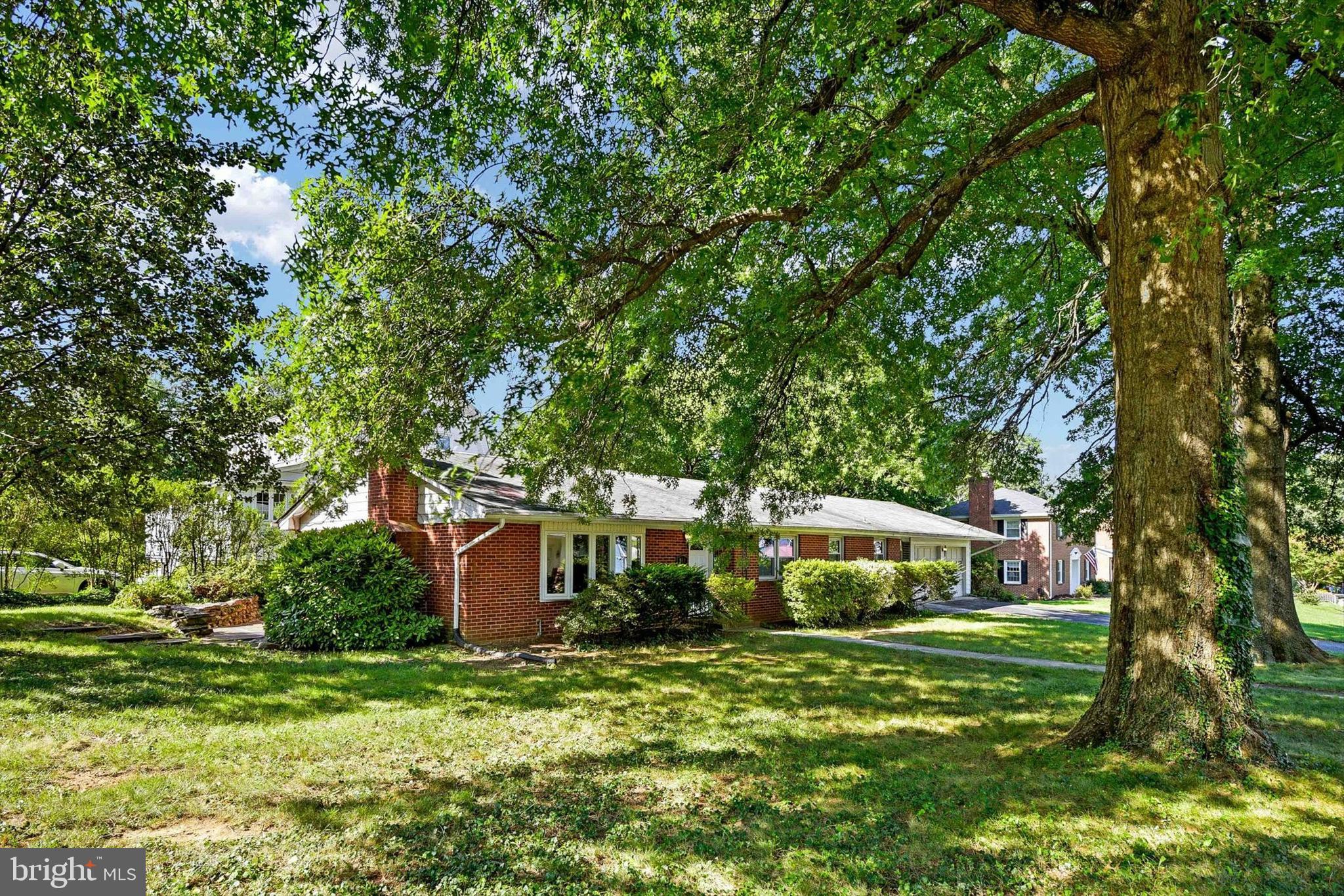 Adorable brick rancher with so much room! The main level of this home is nicely updated and features 3 bedrooms and 2 full baths. As you enter, a cozy living room with fireplace welcomes you. A spacious kitchen opens to a formal dining room with two built in corner cabinets. Laundry is conveniently located on the main level. There is a large basement, that can't wait to be finished! The large garage is perfect for storage or a workshop. Screened in breezeway between the house and garage provides another charming living space. The seller gave you a head start and has done the framing. Add some drywall and paint and you've added a lot of additional living space. . Located on a quiet, dead end street. Currently zoned for Roland Park Elementary and Middle School.