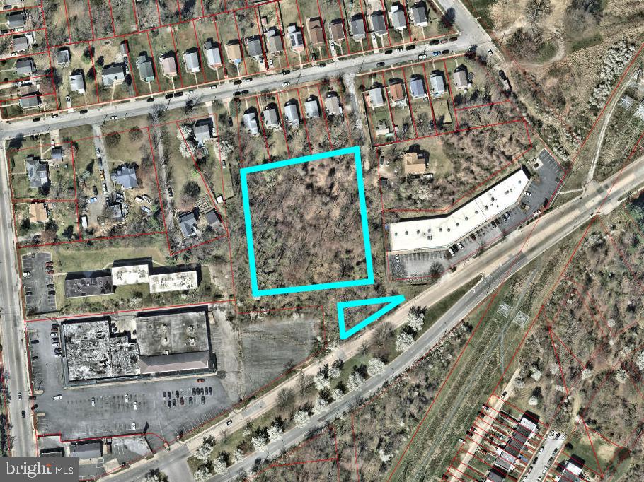 ONLINE REAL ESTATE AUCTION TO THE HIGHEST BIDDER OVER $10,000!! Online Bidding Opens - Tuesday, August 5, 2025. Bidding Closes - Thursday, August 7, 2025 at 12:00 noon. List price is opening bid only. The lots are located in the Frankford neighborhood of northeast Baltimore City. Surrounding neighborhoods include Belair Edison, Waltherson, Hamilton and Parkside. Situated near the intersection of Sinclair Lane and Frankford Avenue, the area is surrounded by commercial shopping centers, garden style apartments and single family homes. Sinclair Lane acts as an artery to both Baltimore City and Baltimore County and Frankford Avenue is a major north/south thoroughfare for the area. I-95, I-895 and RT-40 are within 3 miles of the lots. Restaurants, grocery stores, retail shopping and entertainment are in abundance. Major employers in the area include Morgan State University, several logistics hubs along the I-95 corridor and industrial/factory jobs throughout the Pulaski/Rosedale corridor.
The smaller triangular parcel, known as lot 38, fronts on Sinclair Lane; zoned C-2, commercial. The large rectangular parcel, known as lot 25, is accessed through Dakota Avenue to the south and Schaub Avenue to the west; zoned R-6, residential. Both streets are paper streets that can be seen on the plat.
