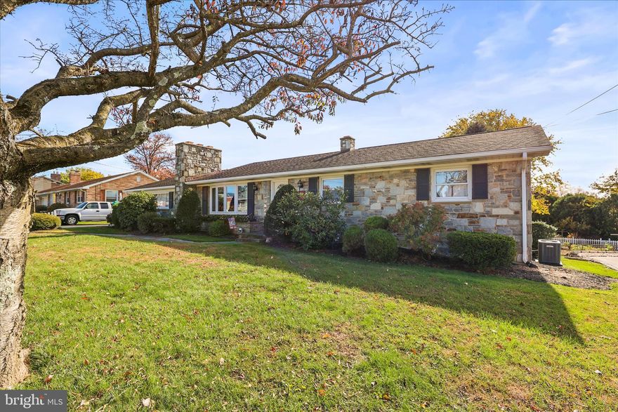 Welcome to this beautiful and charming Stone Rancher. Inside you will find 3 comfortable bedrooms and 2 full bathrooms including one which has been recently remodeled.  The kitchen features a stove with a built in grill - perfect for grill lovers to enjoy year round.  Fresh paint throughout gives the home a bright, welcoming feel.  Enjoy the warm on a fireplace upstairs or the one located in the partially finished walk out basement. Step outside onto the large deck with a gazebo. Ideal for relaxing or entertaining friends and family.  Move in ready and full of character.  This home is also conveniently located close to schools, shopping, restaurants, a public golf course, and a community park.