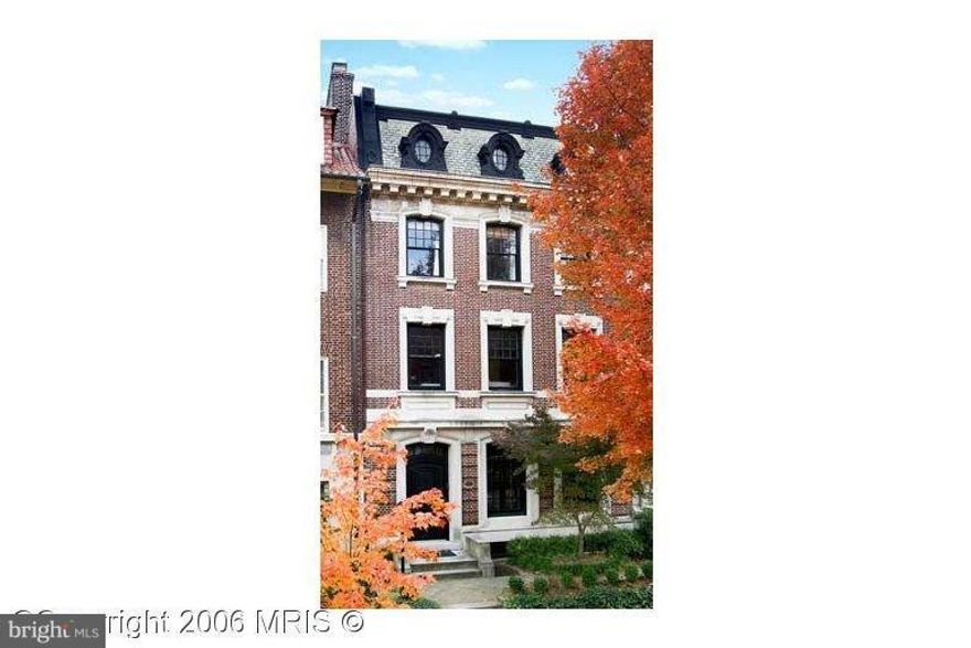 Magnificent townhouse well located on one of Kalorama's most desirable streets!  Spacious well proportioned rooms with original intricate moldings meticulously restored.  Grand entertaining space, with all public rooms on entry level, and leading out to rear terrace.   Elevator, two car garage, fabulous roof deck and english basement with front and rear entry.