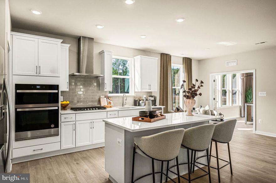 **Move-in ready ** This beautifully designed 2BR/2BA single-story home offers 1,728 sq. ft. of comfortable living space plus a spacious two-car garage. The open-concept kitchen shines with Carrara quartz countertops, white beveled shaker cabinets, a classic 3x6 tile backsplash, and stainless steel appliances—perfect for everyday living and entertaining alike. Toasted taupe wide-plank flooring flows through the main living areas into the inviting great room with a cozy fireplace.

A flexible bonus space offers the perfect spot for a home office, hobby room, or reading nook. The owner’s suite is a peaceful retreat, featuring a tray ceiling, spa-inspired bath with dual sinks and a tile walk-in shower, plus a generous walk-in closet. Convenient 2nd bedroom for guests. Additional storage above the garage adds the extra space everyone appreciates.

Homes like this are moving quickly—don’t miss your chance to make it yours.

About Noble’s Pond: This vibrant active adult community offers resort-style living with amenities like an Olympic-lane pool, fitness center, outdoor kitchen and veranda, bocce, putting green, community gardens, and a lively clubhouse with game room, billiards, and poker table—all complemented by a full calendar of activities led by an award-winning lifestyle director.

Come see why life at Noble’s Pond is so easy to love—schedule your private tour today. ✨
Schedule your private tour today and see how easy—and exciting—life can be at Noble’s Pond.

*Pictures of are model home and for representational purposes only. Please see New Home Consultant for details. Taxes to be assessed after settlement. If using a Realtor: the agent's client must acknowledge on their first interaction with Lennar that they are being represented by a Realtor, and the Realtor must accompany their client on their first visit.  Visit 233 Cosmos Ln model home for access and open houses.*