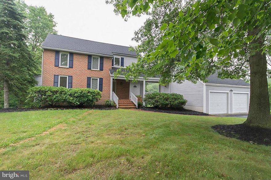 Contemporary cedar and handmade brick "Acorn" home with passive solar design on 2.04 acres. Hardwood floors, vaulted ceilings, and large windows allow for an abundance of natural lighting. Two loft bedrooms sharing a Jack-and-Jill bathroom overlook the fireplace and living room below. Main level bedroom offers single-level living. Finished basement complete with bedroom, bathroom, and 2nd kitchen.