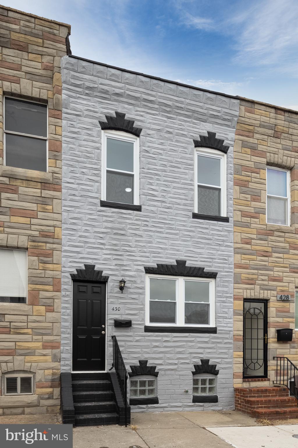 This is your chance to own a fully renovated, move-in-ready home in one of Baltimore’s most sought-after neighborhoods!Thoughtfully updated from top to bottom, this two-bedroom, one-bathroom urban retreat blends modern luxury with timeless charm. Fresh paint, luxury vinyl plank flooring, and stylish new lighting set the stage for a home designed for comfort and convenience. The bright, updated kitchen features custom white shaker cabinets, quartz countertops, top-of-the-line Frigidaire Professional stainless steel appliances, a built-in microwave, and recessed lighting. A first-floor laundry room adds even more convenience.
Upstairs, the spacious front bedroom offers a large closet, a brand-new ceiling fan, and a picturesque downtown skyline view. The back bedroom features a walk-in closet with overhead lighting and another new ceiling fan. The fully remodeled bathroom is a spa-like retreat with dual linen closets, an upgraded vanity, a sleek tub and shower with penny tile accents, and a brand-new toilet. Major upgrades throughout include a brand-new roof, new water heater, all-new cabinetry, countertops, light fixtures, and high-end appliances, ensuring a stress-free, move-in-ready experience.
This prime location puts you steps from Wyman Park Dell, Sisson Street Park, and the popular R. House food hall. Enjoy award-winning dining at Clavel, craft cocktails at WC Harlan, and unique shopping at Mount Royal Soaps—all within walking distance.