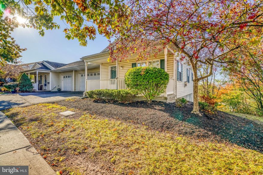 Welcome to 117 W Harmony Drive, located in the highly desirable 55+ community of Manatawny Village in Pottstown. This spacious and rarely offered larger model offers approximately 1,700 square feet of comfortable, low-maintenance living with a flexible and functional layout. Step onto the inviting front porch—perfect for morning coffee or evening relaxation—and into a bright, open interior featuring 2 generously sized bedrooms and a versatile loft space ideal for a home office, guest area, or additional living space. The home is thoughtfully designed to provide both convenience and flexibility for today’s lifestyle. The main living area flows seamlessly, leading to a rear deck overlooking the yard—perfect for entertaining or enjoying quiet outdoor moments. Downstairs, the finished basement adds valuable additional living space and includes a walkout for easy access to the outdoors, offering endless possibilities for recreation, hobbies, or storage. Additional highlights include a private driveway, attached garage, and the ease of maintenance-free living within a well-maintained community. Enjoy all the benefits of 55+ living in a peaceful setting while still being conveniently located near shopping, dining, and major routes.
This is a fantastic opportunity to own one of the larger homes in Manatawny Village—schedule your showing today!