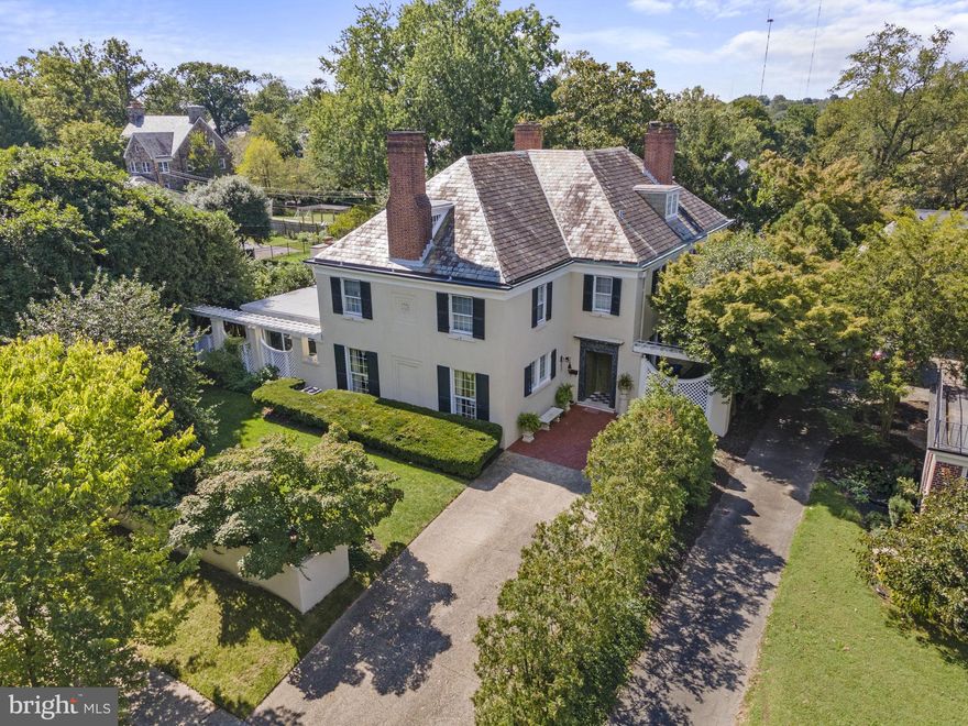 BRAND NEW PRICE.   Welcome to one of 17 Laurence Hall Fowler-built residences in Guilford. A magnificent property that is a timeless masterpiece of architecture with its southern pine hardwood floors and ornate hand-carved millwork. This sprawling 6,600 square-foot home (three floors above ground) boasts seven bedrooms, four full bathrooms, one-half bathroom, and offers an abundance of space for comfortable living and entertaining. The exterior showcases classic architecture and a well- manicured landscape, creating a picturesque setting for this grand estate. Outside you will find a detached garage tucked behind the home and a private paver stone patio adorned with trees. ... Upon entering the home, you are greeted by an inviting foyer leading to the grand curved staircase in the heart of the residence. There is a large sunroom (20 x 40) that floods the interior with natural light, offering a serene space to relax. This sunroom walks out onto an oversized slate patio perfect for entertaining. One of the most notable features of this home is the fully paneled walnut room, appraised by the prestigious Chicago Appraisers Association. This room serves as a distinguished space for gatherings, meetings, or a private library. The home's seven bedrooms are spacious and thoughtfully designed, with each owners' suite featuring its own fireplace, creating a cozy ambiance and a touch of warmth on chilly nights. And while the bathrooms maintain the home’s original charm, they have been updated and lovingly maintained, to offer a touch of history. ... The home's layout has been thoughtfully designed to accommodate both private spaces and areas for social gatherings. The owners have recently renovated the entire kitchen including new appliances, new cabinets, and new quartz countertops. The unfinished basement (additional 1984 sq feet) features tons of storage space, a wine cellar, and a workshop area. The owners additionally had the slate roof reworked and replaced some the custom carpets in the home including the grand staircase. Located in the prestigious Guilford neighborhood, this home offers not only a lavish lifestyle within its walls but also access to nearby restaurants, schools, and parks. With in walking distance to Hopkins Homewood Campus, Calvert School, and Loyola University. Close to Bryn Mawr School, Roland Park Country School, Gilman, Friends and Boys Latin Schools.