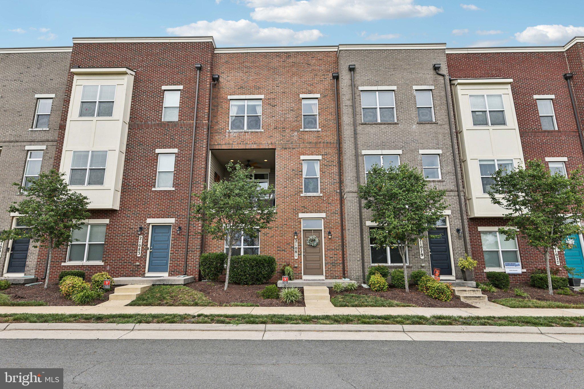 Welcome to 21081 Ashburn Heights Drive, a beautifully upgraded townhome in the sought-after Goose Creek Preserve community. Perfectly positioned at one of the highest elevation points in Ashburn, this exceptional home offers panoramic views that stretch beyond Reston—an extraordinary backdrop that changes with the seasons and elevates daily living. Designed and meticulously maintained by the original owner, this residence stands apart with its expanded floorplan, rare outdoor living space, and a curated selection of tasteful, high-end finishes throughout.
Spanning three finished levels, the layout is both functional and elegant. The entry level offers a private fourth bedroom complete with a walk-in closet and attached full bath—perfect for guests, extended family, or a quiet work-from-home space. The main living level is anchored by a fully upgraded kitchen featuring a center island with stainless steel exhaust hood, upgraded countertops, extended cabinetry, and stylish lighting. This home is the only model in the neighborhood to offer this expanded kitchen design, making it truly one of a kind. Rich, upgraded hardwood flooring runs throughout all levels, adding warmth and cohesiveness to each space.
Just off the main level, the front patio is a standout feature that few homes in the community can rival. Thoughtfully designed with a ceiling fan, enhanced lighting, and premium finishes, this elevated outdoor space offers both comfort and drama. Whether you're enjoying a morning coffee or an evening glass of wine, the views from here are truly special—open, uninterrupted, and expansive. It’s the kind of space that feels like an escape, yet it’s right outside your door.
Upstairs, the bedroom level offers a peaceful retreat with a spacious primary suite, walk-in closet, and a well-appointed en-suite bath. Two additional bedrooms share a full hall bath, and soft carpet in each bedroom adds comfort underfoot. A brand-new roof was recently installed, ensuring long-term value and peace of mind.
Goose Creek Preserve is a beautifully maintained community with a pool, clubhouse, fitness center, playgrounds, walking trails, and wide green spaces. Located just minutes from Goose Creek Village, Brambleton Town Center, and One Loudoun, everything from groceries to fine dining is within easy reach.
For commuters, this location offers quick access to the Dulles Greenway, Route 7, and Route 28, and is less than 10 minutes to the Ashburn Metro Station. Dulles International Airport is a short drive away, making both regional travel and international flights convenient and accessible.
With its elevated setting, distinctive upgrades, and a patio that brings the outdoors into everyday life, 21081 Ashburn Heights Drive is a rare opportunity to live beautifully in one of Loudoun County’s most scenic and well-connected communities.
