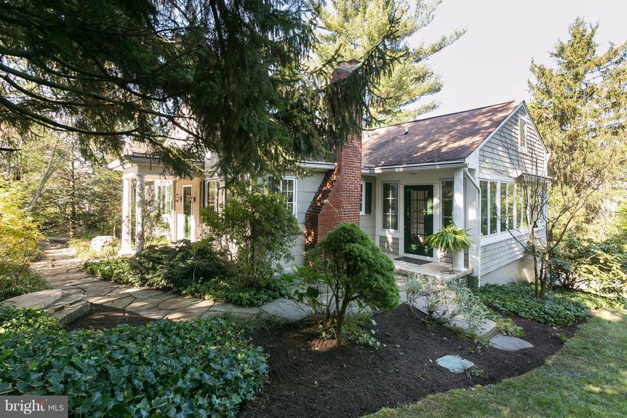 Special cape in the heart of Ruxton. Situated on a lovely lot, this house boasts 4 bedrooms and 3 full baths, new windows and an updated kitchen that opens to a sun room overlooking the glorious park like side yard. Whole house generator, irrigation system too. Driveway is accessed off Locust Avenue and leads to a 1 car garage with electric car charging station. Great schools, stores and trails!