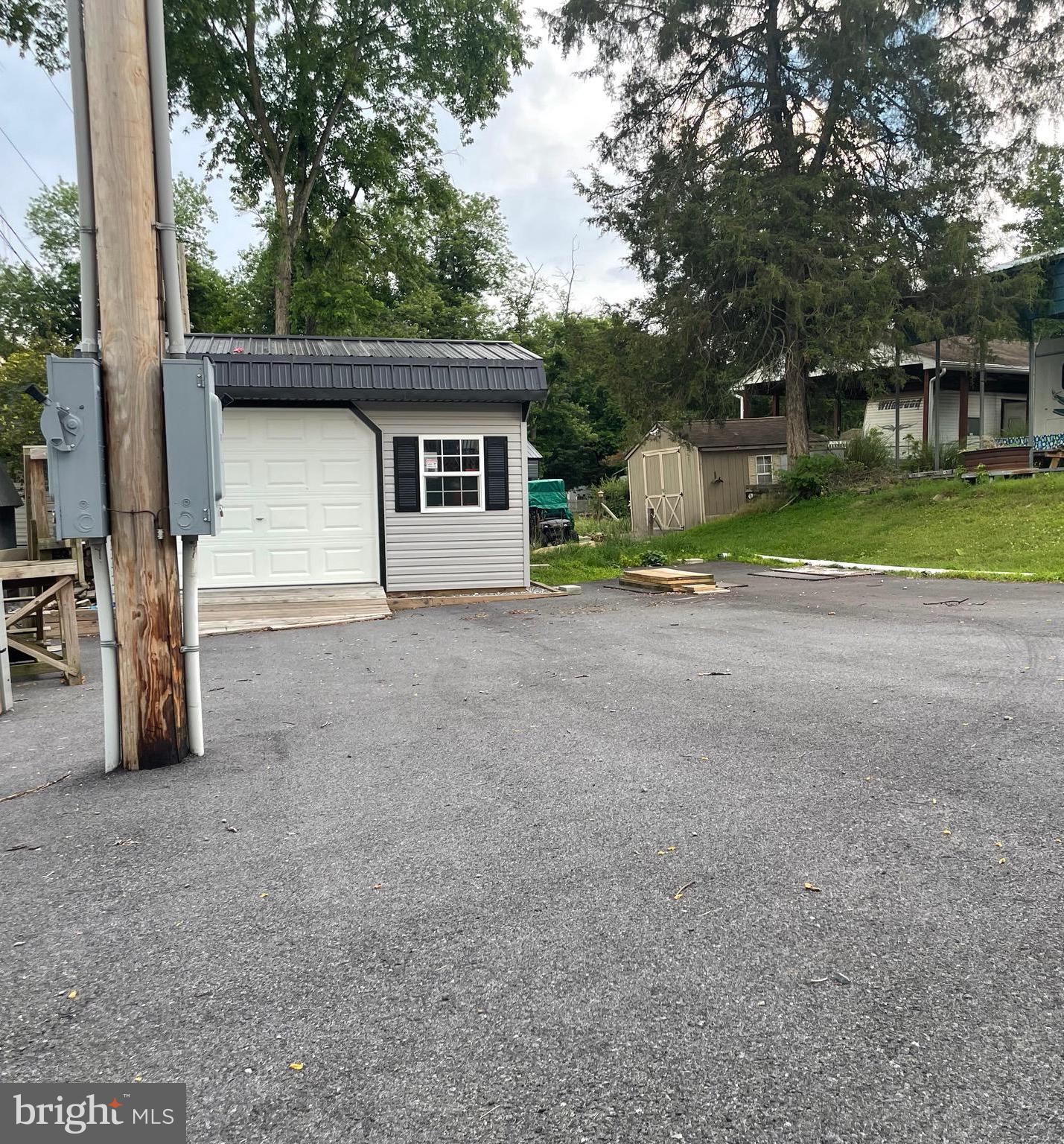 This is a vacant lot. Paved for camper and parking. Dues include your electric, water and pump-out for sewer and all the amenities! Lot 9 adjacent to this lot is also for sale. Could make a bundle purchase or get that family member or friend to purchase next door! To view the property, Riverbend Park is a gated community, so you need to enter at the guard shack. Entry is not permitted without ID per the office rules. Bring IDs to the office or guard shack for visitor pass. THIS IS A SEASONAL CAMPGROUND -OPEN FROM APRIL 1 TO NOVEMBER 1. River Bend is a privately owned 400 acres recreational- vehicle camp resort with seasonal activities for members, families and guests. This great RV park is tucked away on the Upper Potomac River of West Virginia; River Bend is one of West Virginia's most popular family seasonal destinations. Just a short drive from the Washington and Baltimore metro area. Open with utilities from April 1 to November 1. (Lot owners have access to their property during the off season). Riverbend Park offers lots of fun and entertainment, or a great place to get away and relax. 10 miles of Deep water on the Potomac River, access for boating, fishing & swimming and other park amenities include 3 swimming pools, putt putt course, Horseshoe club, Boat club, Poker runs, Trick or Treat, Christmas in July, live bands, basketball court, tennis court, fireworks, car show, Church, restaurant, bar, convenience store, playground, volleyball, ball field and much much more.