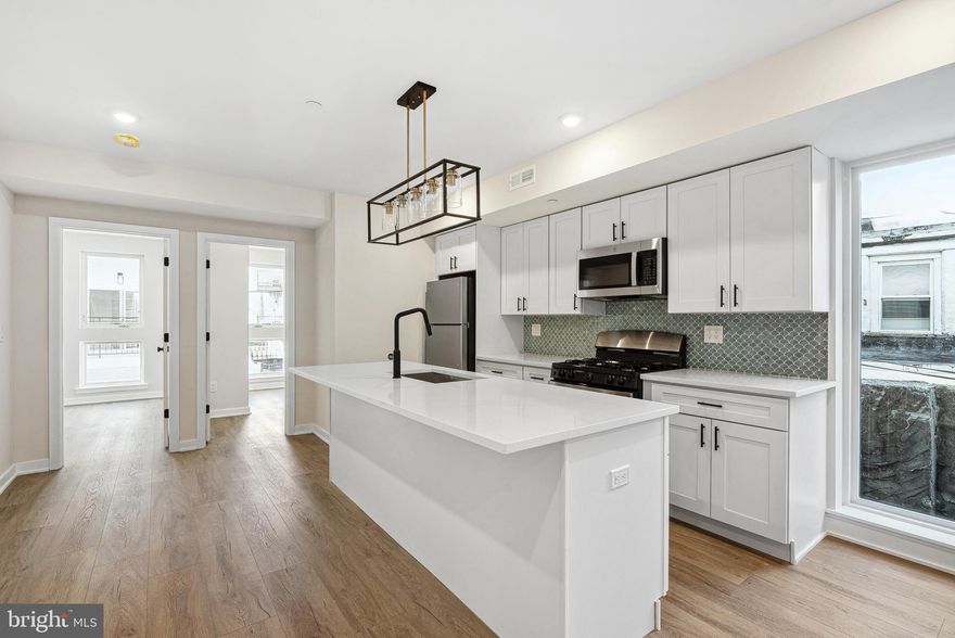 Welcome to 138 Tasker St, a brand-new construction building offering modern living at its finest. This beautifully designed unit features a spacious layout, hardwood floors, and high-end stainless steel appliances—including an in-unit washer/dryer, dishwasher, garbage disposal, microwave, and oven/stove. Enjoy sleek, contemporary bathrooms, and large windows throughout the unit that bring in abundant natural light, creating a warm and inviting atmosphere.  You are just steps from Dickinson Square Park and the Delaware River Waterfront, as well as tons of vibrant cafes and restaurants. Parking is available for just $150/month, a convenient price with I-95 just a few minutes drive away. Pets are welcome—cats with a one-time $350 non-refundable fee, and dogs with a $500 non-refundable fee (size and breed restrictions apply). Don’t miss the opportunity to live in one of Philly’s most desirable neighborhoods!