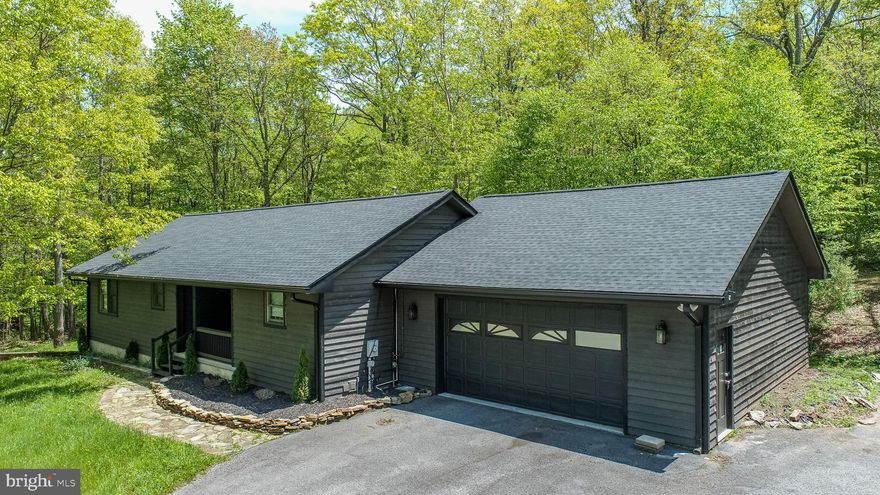 Stunning, Completely Remodeled Single-Family Home on 1+ Acre Lot – Ideal Location Near Deep Creek Lake!

Nestled in a private, serene setting, this beautifully remodeled 4-bedroom, 3-bathroom home offers modern updates and expansive living spaces both inside and out. With over 2,800 sq. ft. of finished space, this home has been thoughtfully upgraded, featuring a brand-new roof, HVAC system, water softener system and water heater, ensuring comfort and efficiency for years to come. All water lines have been replaced with PEX! 

The open-concept main level includes a spacious living room, a fully updated kitchen with premium finishes, and a dining area that leads to a large deck – perfect for outdoor entertaining. The finished basement adds 2 more bedrooms, 1 full bathroom and even more living space, ideal for a family room, home office, or recreational area.

The attached oversized garage provides ample storage, while the detached garage, complete with 8 horse stalls, offers incredible versatility for hobbyists, equestrians, or those in need of extra workspace. A heated office space is also located in the garage. 

Enjoy the peace and privacy of over an acre of land, all while being just minutes away from the best of Deep Creek Lake. Whether you’re looking for outdoor adventure or relaxation, this home is conveniently located near Savage River Reservoir, New Germany State Park, and an array of other recreational amenities.

This property is truly a rare find—schedule your showing today and make it yours!