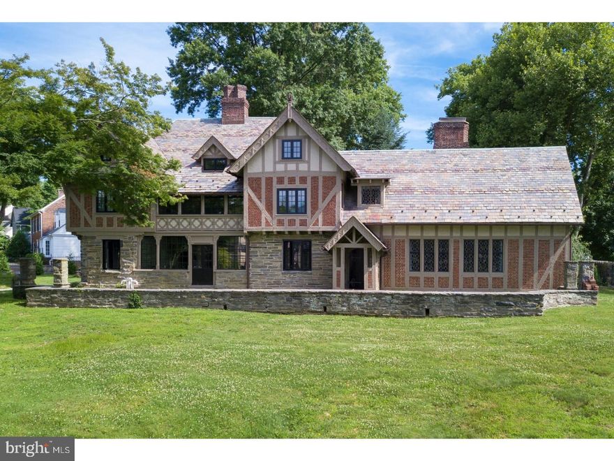 From its original construction in 1925,  the extraordinary residence, "Assisi" has  long been recognized as one of Wayne's landmark properties and architectural zeniths. Surrounded by a shoulder high stone wall and capped with a multi-colored slate roof, this 5 bedroom 3 and 2 1/2 bath Arts and Crafts stunner was comprehensively renovated in 2014-2016. The owners, seeking to right-size, were unwilling to compromise on anything but useless square footage and assembled an extraordinary team of design talents including Period Architecture, Linda Phillips interiors and Trey Halkett woodworking to execute a flawless jewel of a home where no space is unimportant and no detail compromised.  The result a sophisticated, important highly crafted but welcoming home within a short walk to the towns center.