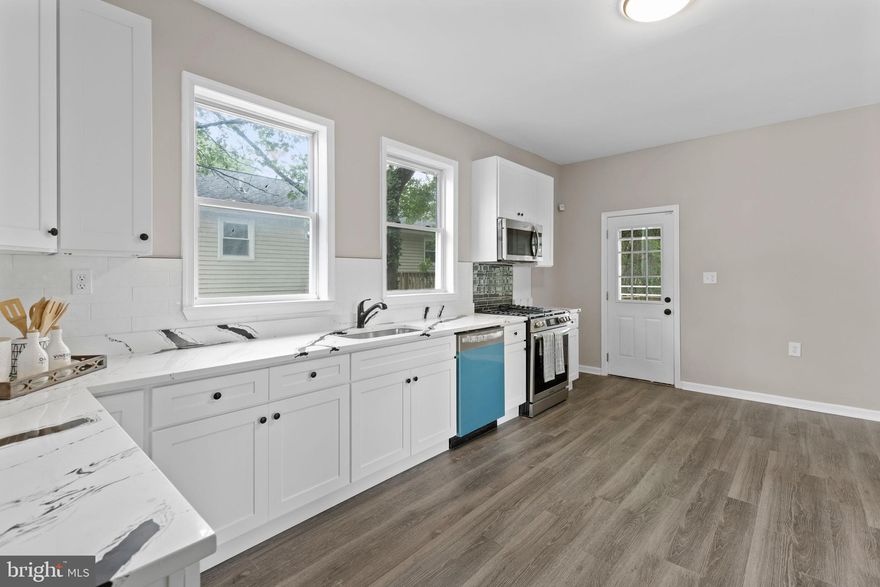Fully Renovated Corner Lot with Modern Open Layout, Expansive Yard & One-of-a-Kind Owner’s Retreat!



Welcome to 4501 Parkmont Avenue — a beautifully redesigned and move-in-ready home sitting proudly on a spacious corner lot in Baltimore. This standout property combines modern finishes, a flexible floor plan, and a rare upstairs owner’s suite that offers both privacy and luxury.



From the moment you arrive, the curb appeal is undeniable. The large, fenced-in yard provides plenty of space for entertaining, pets, or simply relaxing in your own outdoor oasis.



Step inside and experience the completely open-concept main level, where natural light pours into the living, dining, and kitchen areas. The fully renovated kitchen features modern cabinetry, stainless steel appliances, and stylish countertops—perfectly set up for everyday cooking or hosting friends and family. A full bathroom on this level adds convenience and thoughtful design to the main floor layout.



Downstairs, you’ll find a finished basement space that can easily function as a home office, guest room, or bonus bedroom—ideal for today’s work-from-home needs or flexible living arrangements.



Up on the second level, there are three spacious bedrooms, including one with its own private en-suite bathroom, offering added comfort and privacy. A second updated full bathroom in the hallway serves the remaining rooms with ease.



But the real showstopper is the owner’s suite, which takes over the top two levels of the home. The main sleeping quarters are located on the second level, but just up the stairs, you’ll discover an entire private floor featuring a massive walk-in closet, full spa-like bathroom, and a personal retreat area—perfect for relaxing, dressing, or creating your own peaceful sanctuary away from the rest of the home. It feels like having a luxury penthouse inside your own house.



With its thoughtful layout, designer finishes, and prime location near major highways, schools, and amenities, 4501 Parkmont Avenue offers both function and flair.



Come see it for yourself — schedule your private showing today and fall in love with the space, style, and comfort this home delivers!