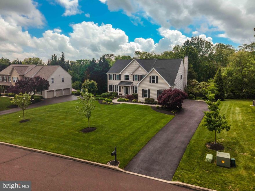 Move In Ready! Stunning 4 Bedroom, 4.5 Baths, First Floor Study, Dual Staircases, 2 Gas Fireplaces,  3 Car Side Entry Garage with a Finished Walk Out Basement with a Full Bath located in Barrington Estates in Perkiomen  School  District.  An absolute meticulously maintained and updated home inside & out.  Fresh Newly Installed Carpets in All Four Bedrooms, Upper Floor Hallway and Front & Back Staircases, Finished Basement TV Area & Basement Stairs.  Additionally, Nolan Painting was contracted and painted in May 2025 all the trim, ceilings, closets, pantry and two bathrooms. Newer Roof, Siding, Seamless Gutters, Fenced Backyard, Entry Covered Overhang Added Plus New Front Door, Windows Replaced Throughout with Double Hung Energy Efficient Windows,  Newer Anderson Slider Doors in the Kitchen & Walk Out Basement, Irrigation System in Place for the Front Lawn & Beds (serviced twice a year), Water Softener, Newer HVAC, Deck Awning, Patio with Three Remote Controlled Screens AND SO MUCH MORE. Upon arrival, you will be in awe of the wonderful landscaping that surrounds the home and the stamped concrete front walk and porch.  The three car side entry garage has 3 newer Lift Master garage door openers with MyQ internet connectivity plus an additional storage area along with overhead storage racks. A serene backyard will greet you, picture yourself relaxing on the expansive deck enjoying your morning tea/coffee under the Sunset Awnings.  For the evening, the deck is complimented with Lighted Tops and Steps. The covered patio is nicely accented with a ceiling fan along with (A Must See and Guaranteed, you'll love it) remote controlled privacy screens.  From the driveway and fenced yard entry, there are stamped concrete steps that lead to the expanded patio.  Additionally, this amazing home has landscape & exterior home lights on timers in the front and back of the home. As you enter into the home, there is a Curved Two Story Foyer with beautifully refinished hardwood flooring that flows through to the Kitchen and Powder Room. Nine Foot Ceilings on the main level. Separate Formal Living and Dining Rooms with newer carpet. The kitchen is equipped with a Double Oven, Built-In Microwave, New 2025 Dishwasher, Island, Pantry and Breakfast Room.  The Two Story Familyroom has newer carpet, a wall of windows, gas fireplace and back staircase leads to the upper floor.  All four bedrooms are a generous size with a ceiling fan in each bedroom. 2nd & 3rd Bedrooms are connected with a Jack and Jill Bath that has a private toilet room with a tub/shower combination.   The Jack and Jill Bath nicely updated with a new comfort height toilet, light fixtures and two vanity sink faucets,  The 4th bedroom has access to the hallway full bath with newly installed comfort height toilet and vanity sink faucet.  The luxurious primary bedroom has a sitting room and two very generous sized Walk-In closets.  In the primary bedroom sitting room, there is an access door which leads to an unfinished attic space, which could be finished.   A Fully Renovated Primary Bathroom is absolutely gorgeous with a Higher Vanity, Heated Tile Floors, Frameless Oversized Shower, Separate Tub, Frosted Window and Comfort Height Toilet.  We are not done yet! The Finished Walk-Out Basement has a newer Anderson Slider Door that leads to the Covered Patio which is a "WOW".  New very recently installed luxury vinyl flooring installed in the bar area, along with new carpets installed on the Basement Steps & the TV Area with a 2ND Gas Fireplace. To complete this magnificent room, there is a Beautiful Full Bath with Heated Floors & Shower PLUS a Large Storage Room with a Dual Sump Pump with a Battery Backup(New Batteries recently replaced).  Why wait to build!!  115 Burgess is Loaded with Endless Upgrades.  Located in a fabulous neighborhood and school district that is conveniently located to shopping, restaurants, travel routes and Much More!