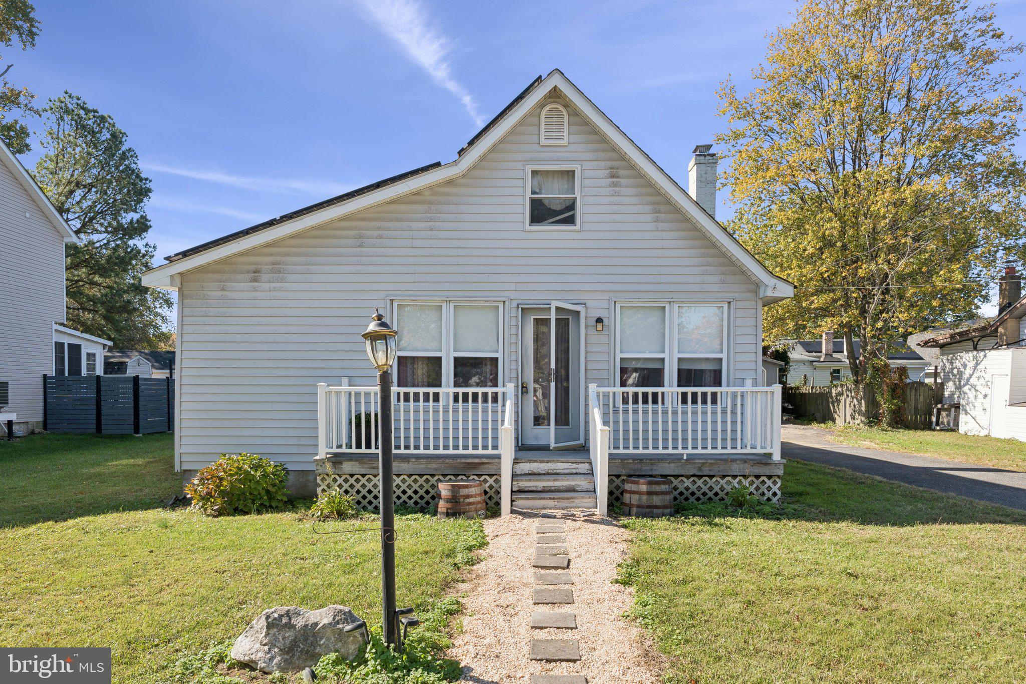 Welcome to 3718 4th Avenue, located in the Selby on the Bay community! This charming one-level home offers over 1,200 square feet of living space with a cozy brick fireplace, large deck for entertaining, and detached garage. The attic is finished and ready to be used as an office, playroom or a 3rd bedroom. Enjoy the coastal lifestyle with access to the  private community beach, boat ramp, and docking area, perfect for kayaking, paddleboarding, and waterfront relaxation. This home is ideal for year-round living or a weekend getaway. Experience the best of the Chesapeake Bay lifestyle in Selby on the Bay!
