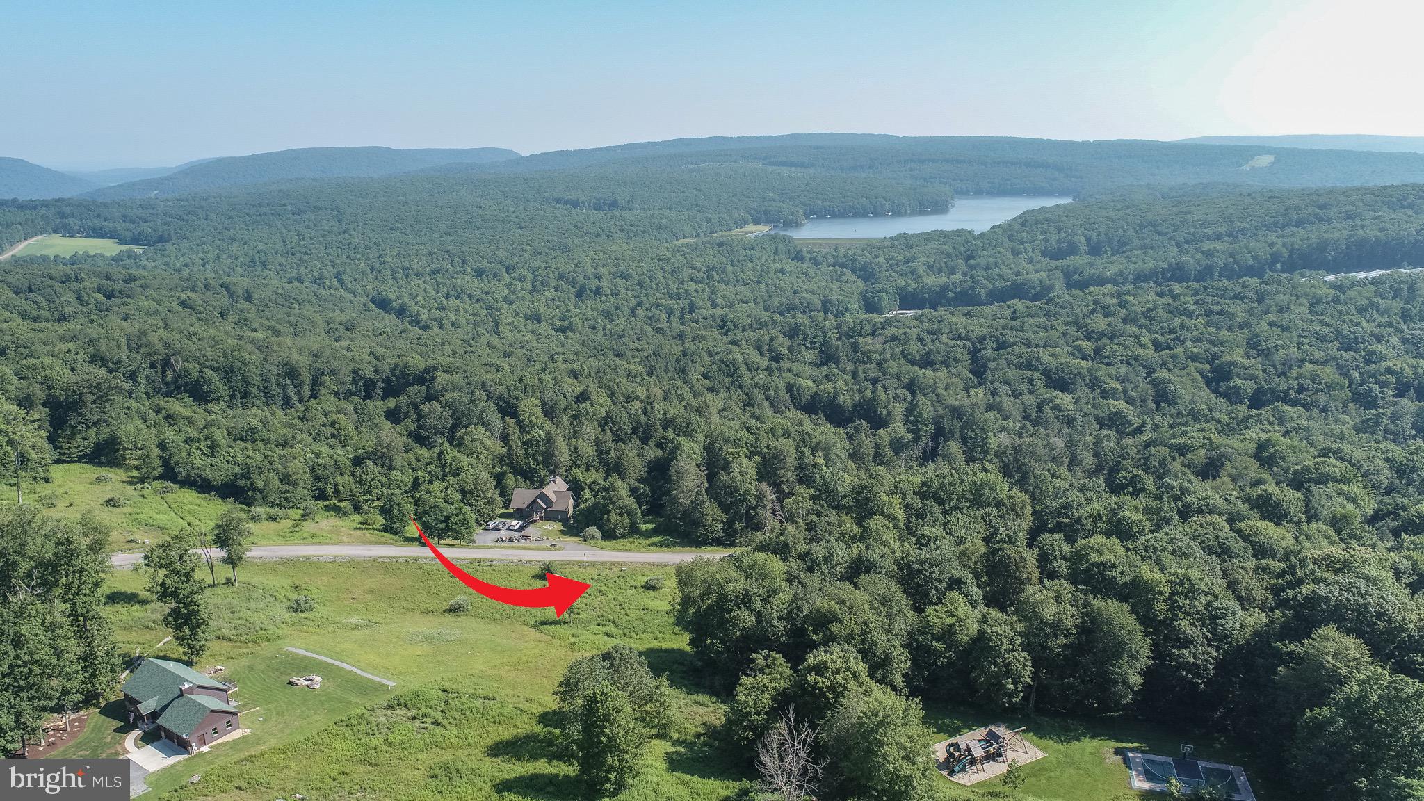 Build your dream home or vacation retreat on this beautiful 0.59 acre lot in Bray Run! Just a short drive to the Deep Creek Lake area, you’ll have easy access to boating, paddling, fishing, and state park facilities. This ready to build site is part of a peaceful mountain community offering excellent amenities. Enjoy a playground, basketball court, scenic hiking trails, and the beauty of Bray Run Stream winding through the common area. Wisp Resort is also nearby, providing year round activities. With serene surroundings and unbeatable views throughout the Bray Run community, this is a setting you’ll love. Don’t miss your chance to own a homesite in one of Western Maryland’s most inviting communities. Call today for more information!