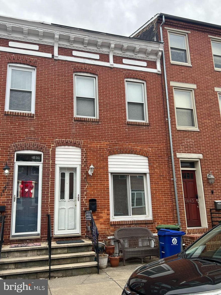 This 2 bedroom + den row home is located in the heart of Locust Point. This property is just a block away from Francis Scott Key Elementary/Middle school, around the corner from Latrobe Park, and bars/restaurants are walking distance. This row home is very wide compared to other homes in the area, has a dining room separate from living room and kitchen and also a laundry room in the rear of the home. Owner had refinished the deck in the back of the home less than 3 years ago, which also has a fenced yard. On the second floor is both bedrooms and full bathroom. Master bedroom has large cedar closet, and both bedrooms have ceilings fans. Come check it out before it's gone!