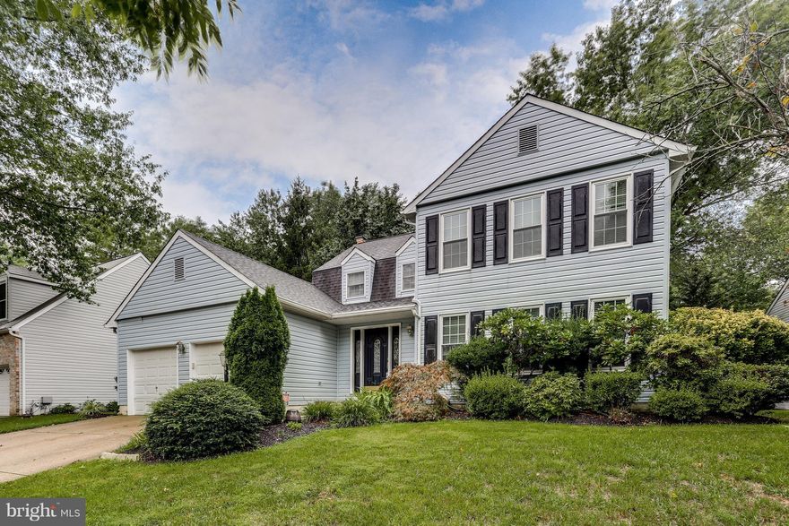 JUST REDUCED!! Beautiful and well maintained colonial in desirable neighborhood! Home features large open kitchen and family room combo, with stainless steel appliances and table space, fully finished basement with room with office, play area, or entertainment space, large open yard with deck for relaxing in the summer, four large bedrooms with en-suite master bath and more!