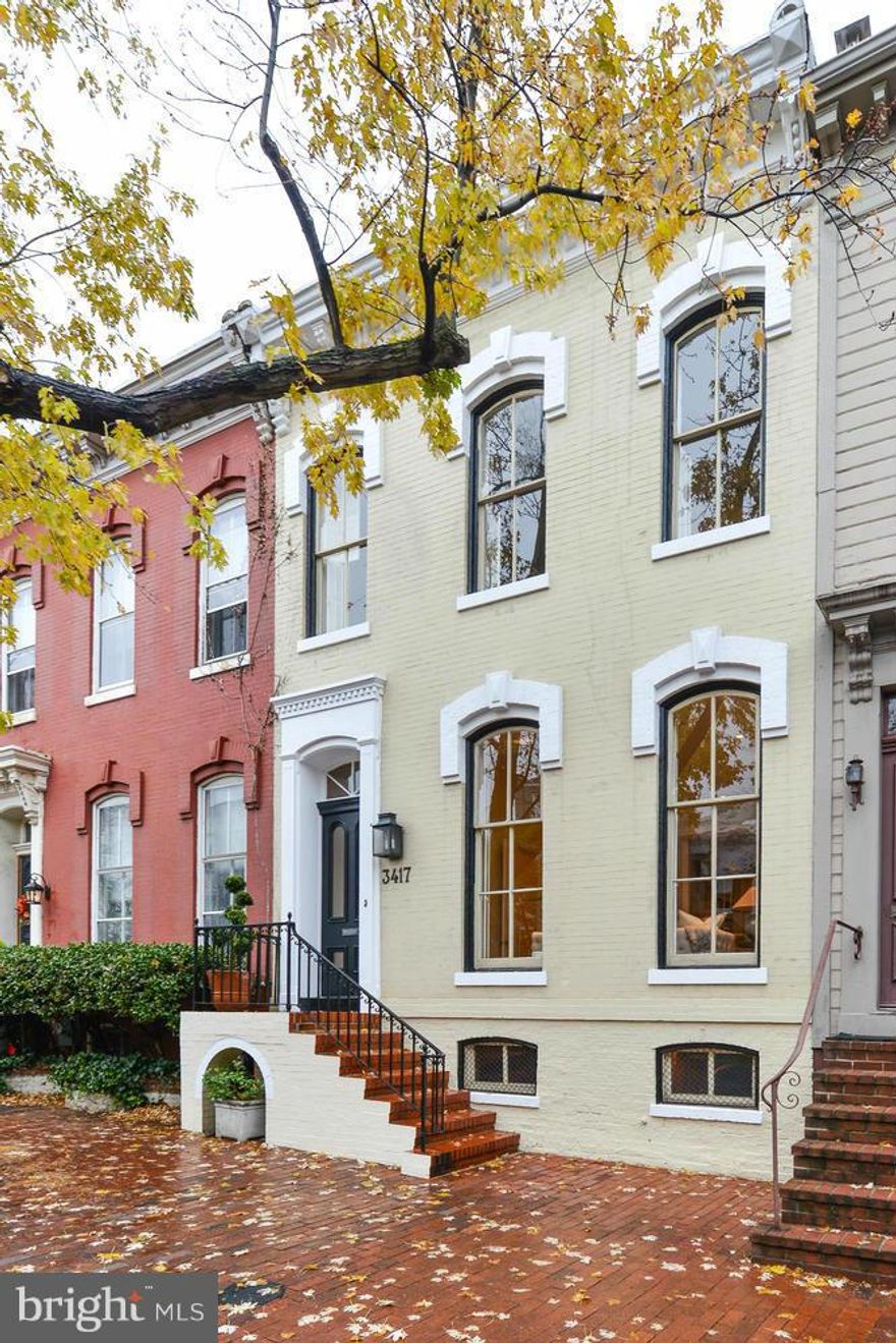 Significant price reduction! Sunny 3BR/2BA Victorian townhome in Georgetown's coveted West Village with separately-deeded two-car garage and space for another car.  Beautifully updated, this south-facing home has a separate dining room, galley kitchen, welcoming family room leading to a landscaped  garden.  Conveniently located near GU and Wisconsin Ave.