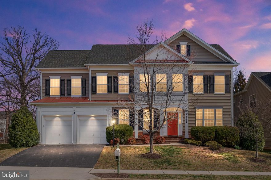 Pristinely Maintained Property in Prince William County! This beautiful home offers 5 bedrooms, 4.5 baths, 5,273 square feet, hardwood floor throughout and incredible craftsmanship.  Be welcomed into a bright foyer adorned with gorgeous HDWD, flanked by formal living and formal dining room, ideal for entertaining. Just off the stairs you will see a very large dedicated office.  There is stunning details like picture frame molding and double crown, that truly accentuate these formal spaces. Flow with ease through butler's pantry into gourmet kitchen, flaunting granite counters, center island, wall oven and tile backsplash. Expansive family room centers around the coziest gas fireplace.  Some stellar updates to highlight include finished basement in-law suite, fresh paint and new carpet and LVP flooring in basement. Finished basement is great for in-laws with added kitchenette , large family room, bedroom with full bath, 2nd laundry area in enormous walk-in storage space. Making way to the 2nd level, primary suite exudes luxury with double door entrance, walk-in closet and private en suite with tile floors, separate granite vanities, garden tub & walk-in shower. Additional three generous-sized bedrooms on second each offer plush carpet and oversized closets. Convenient laundry room can be found just around the corner. Not to be missed, an incredible private backyard awaits, with large rear deck, quaint pergola and sprawling yard perfect for kids and pets to run and play.