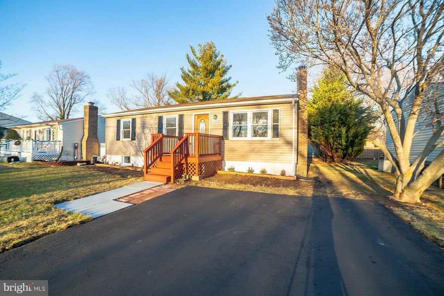 Just like a new home. New upgrade kitchen with granite counter top, new stainless steel appliances, crown molding and recessed lights. Quite open and bright living room. Lower level is fully improved with fully new bath, bed room, recessed lights, and much more. Huge backyard & deck. Private drive way. SHOWS WELL.