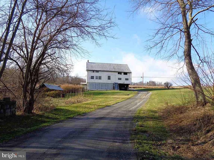 WATERFRONT BARN CONVERTED TO A HOME! Enjoy 1.7 acres of land including creek with plenty of trout! Plenty of garden space.  Room for chickens & small farm animals. Economical lifestyle with solar barrels/panels. 2-3 bedrooms, full bathroom, open kitchen & living room area.  Cash offers or land financing only, priced accordingly.  Beautiful countryside and lots of potential!