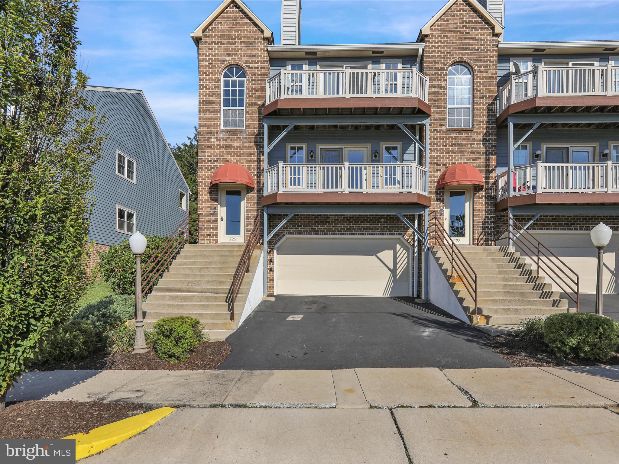 Welcome to maintenance-free living at Mountain View Commons, located in Reading School District. This lovely two-bedroom, two-bath condo offers comfort, convenience, and modern updates throughout. The spacious living room fills with natural light and opens to a private balcony with city views, perfect for relaxing or entertaining. Just off the living room is a dining area and a nicely appointed kitchen featuring a new gas range and dishwasher. The primary bedroom suite includes a walk-in closet and full bath, while the second bedroom and additional full bath provide an ideal setup for family, guests or a home office. Recent updates include new vinyl flooring in the living room, dining area, and hallway, plus brand-new carpeting in both bedrooms. Efficient gas heat and central air ensure year-round comfort. Additional highlights include an attached two-car garage for secure parking and extra storage. Conveniently located close to everything, this condo combines easy living with an unbeatable location. Schedule your private showing today.