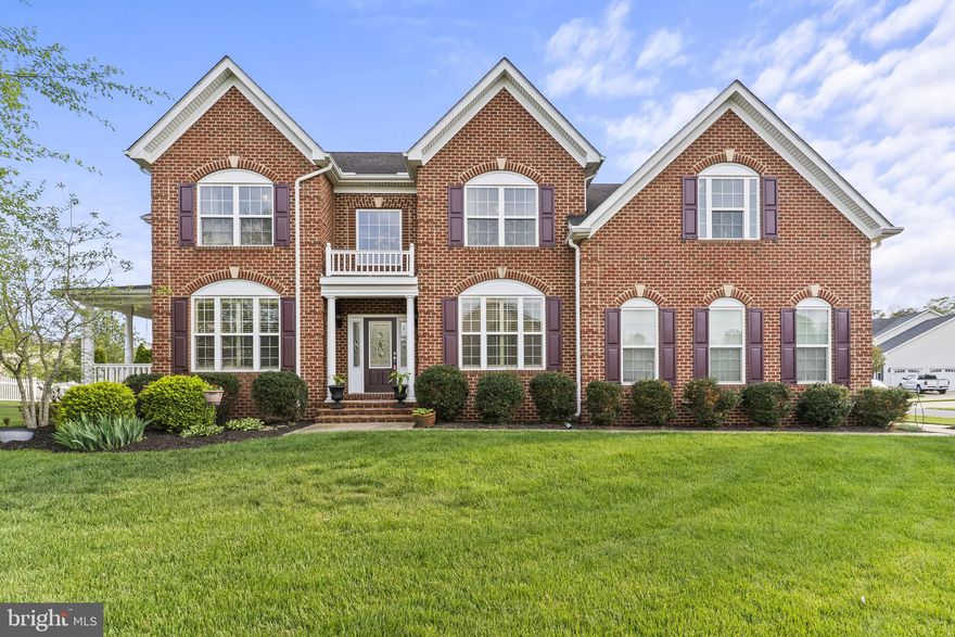 Welcome to 41389 Holiday Court, a stunning QBH Sotterley model located in the highly sought-after QBH community of Leonard’s Grant! Perfectly positioned on a desirable corner lot, this beautifully maintained 5-bedroom, 3.5-bath home offers the ideal blend of space, functionality, and thoughtful upgrades throughout.

Step inside to find gorgeous hardwood floors flowing through the main level, complemented by a private home office, perfect for today’s work-from-home lifestyle. The heart of the home is the grand kitchen, featuring an upgraded oversized island, butlers pantry, abundant cabinetry, and ample space for gathering, entertaining, and everyday living.

Just off the kitchen, unwind in the screened-in porch or step outside to the paver patio, creating a seamless indoor-outdoor living experience. The backyard also includes a shed for additional storage and plenty of room to enjoy.

Upstairs, retreat to the spacious primary suite complete with a luxurious QBH deluxe shower, offering a spa-like feel. Additional bedrooms provide flexibility for family, guests, or hobbies.

The finished basement expands your living space even further with a fifth bedroom and full bath, plus a dedicated theater room—already equipped with projector wiring and surround sound, making it ready for movie nights or game days from day one.

Additional highlights include a 2-car side-load garage, generous storage throughout, and a layout designed for both comfort and convenience.

Located in the vibrant Leonard’s Grant community, you’ll enjoy sidewalks, community amenities, and a welcoming neighborhood feel—all just minutes from shopping, dining, and local attractions.

This home truly has it all—space, upgrades, and a location you’ll love. Schedule your private showing today!